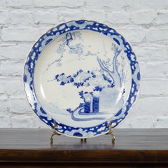 19th Century Japanese Porcelain Plate with Hand-Painted Blue and White Décor