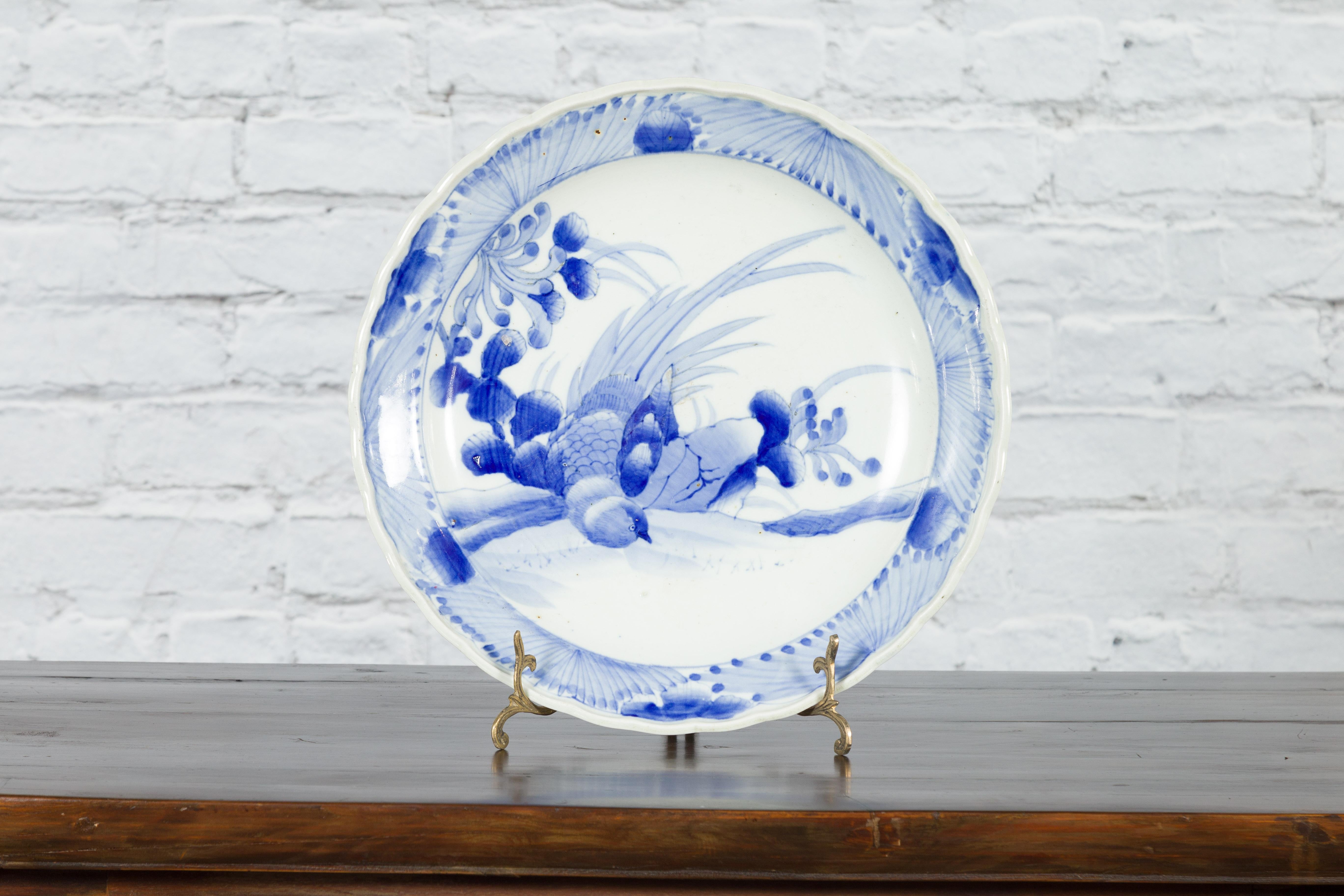 19th Century Japanese Porcelain Plate with Hand-Painted Blue and White Décor In Good Condition For Sale In Yonkers, NY