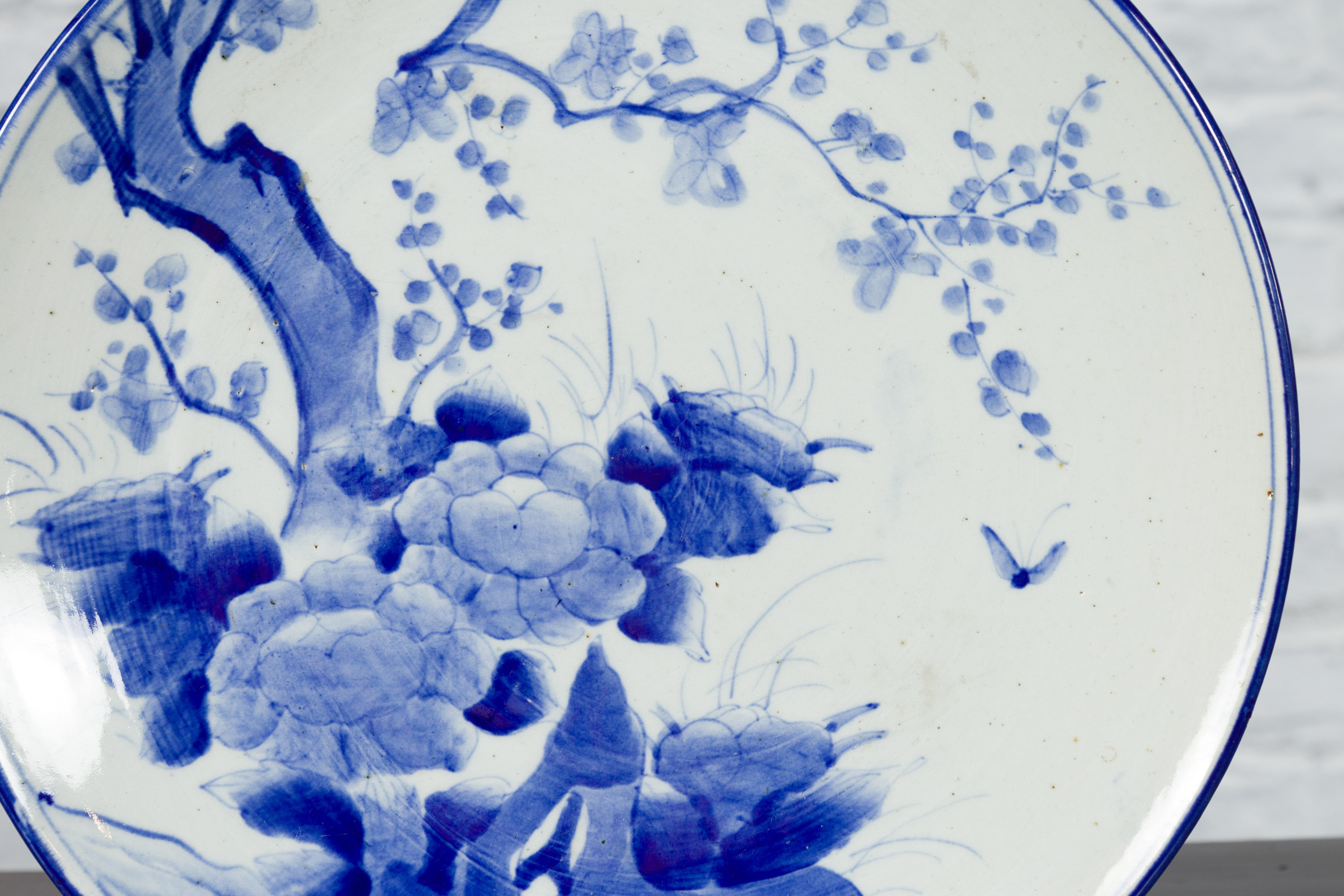 19th Century Japanese Porcelain Plate with Hand-Painted Blue and White Décor In Good Condition For Sale In Yonkers, NY