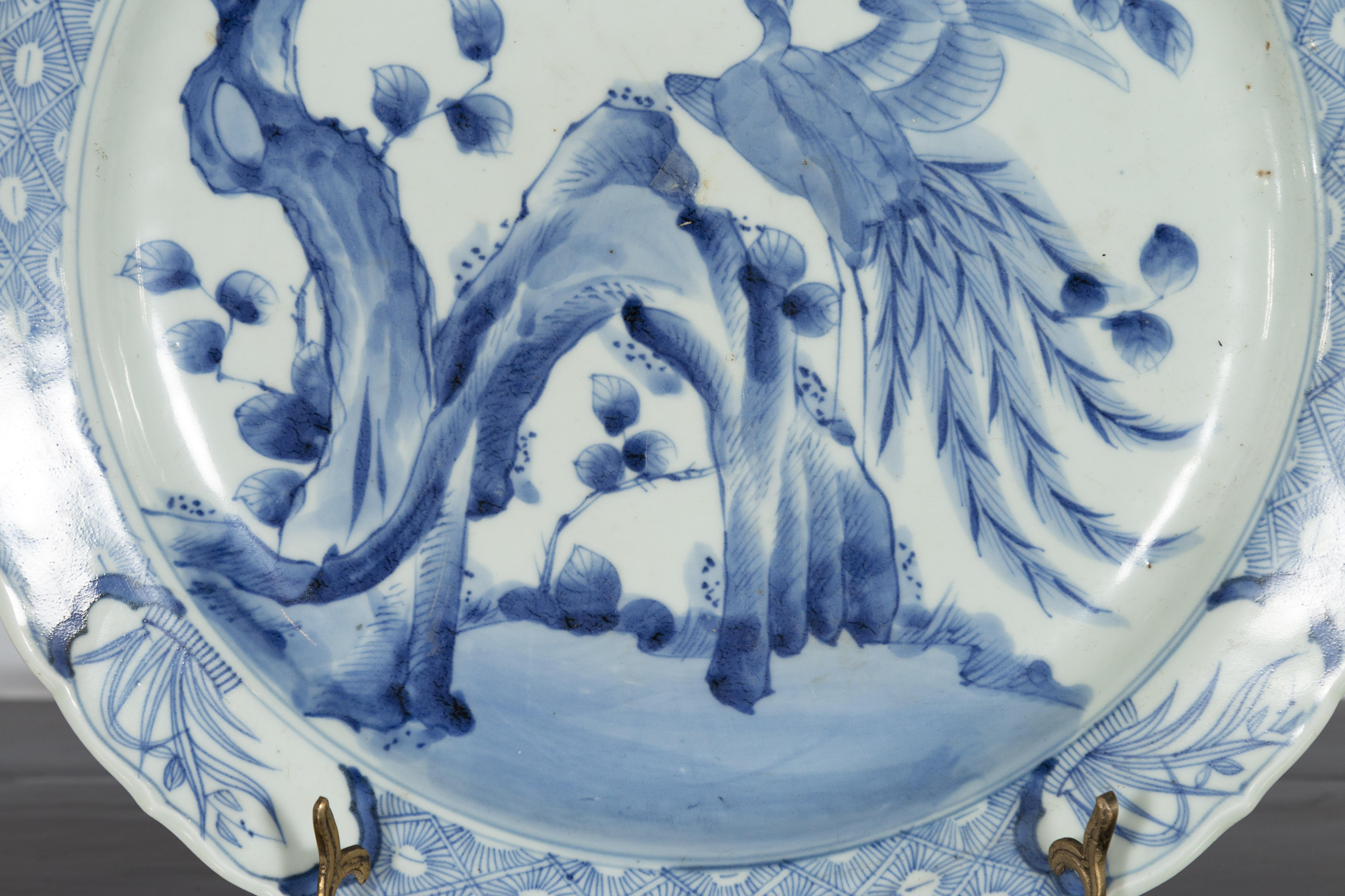 19th Century Japanese Porcelain Plate with Painted Blue and White Bird Décor For Sale 6