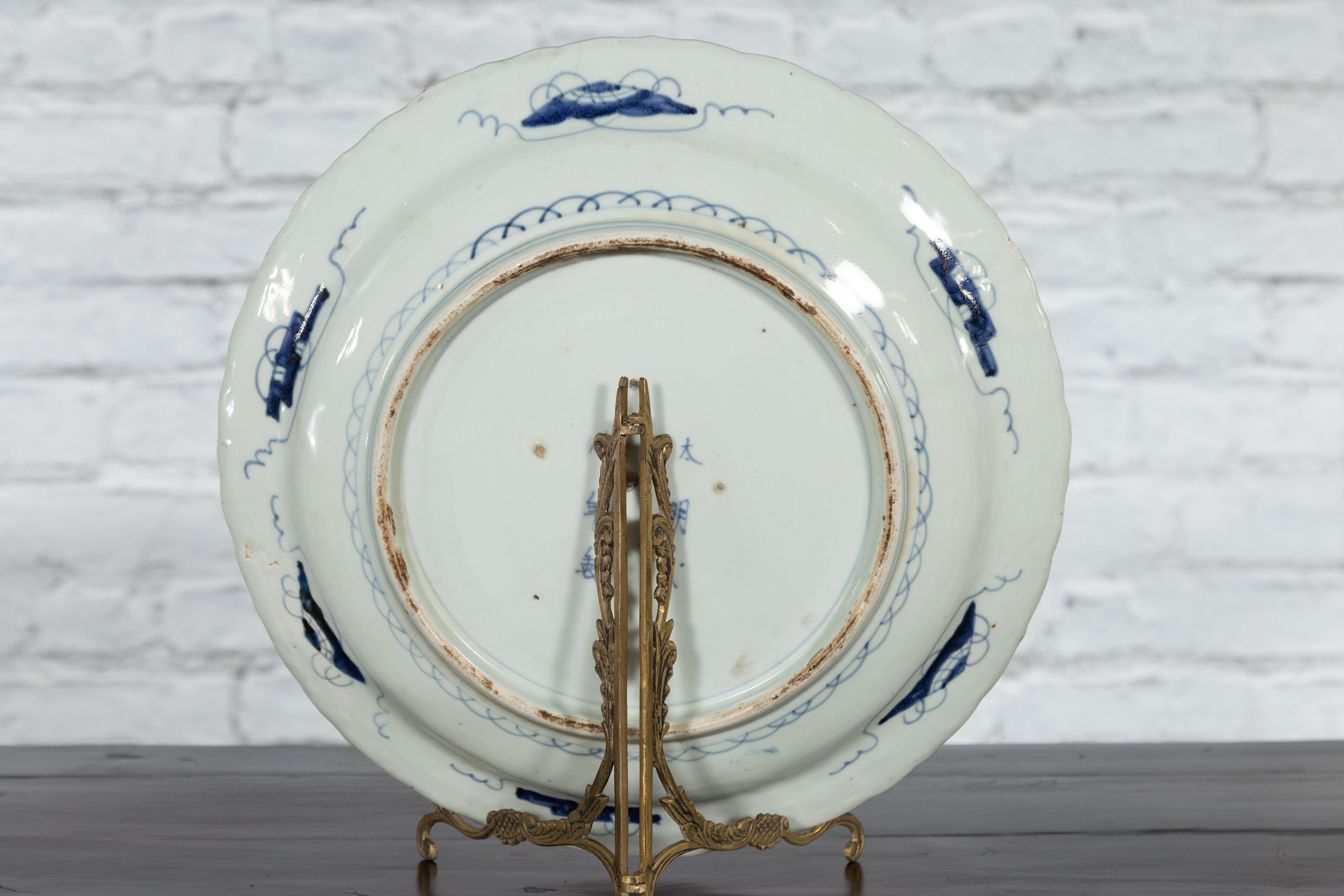 19th Century Japanese Porcelain Plate with Painted Blue and White Bird Décor For Sale 8