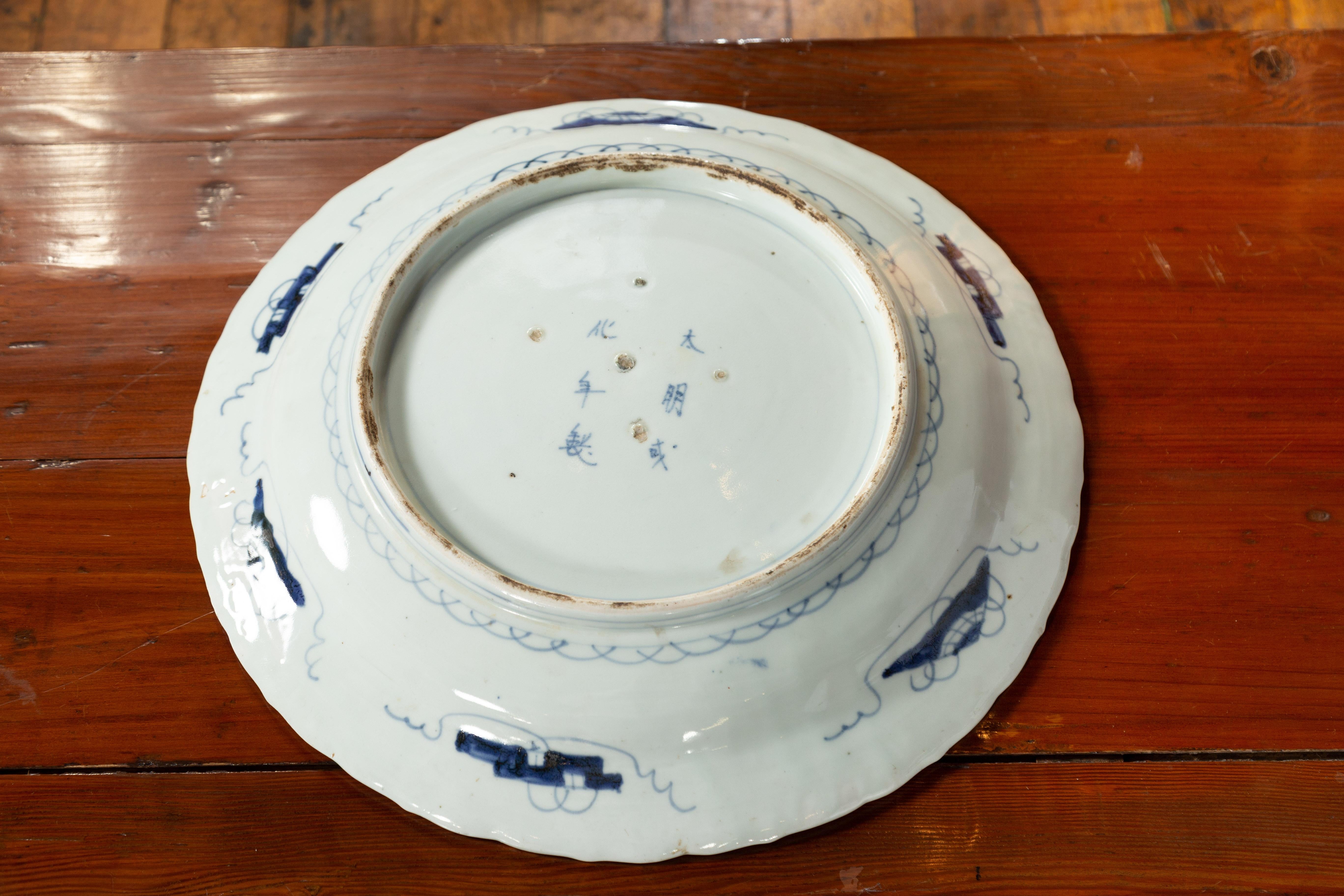 19th Century Japanese Porcelain Plate with Painted Blue and White Bird Décor For Sale 10