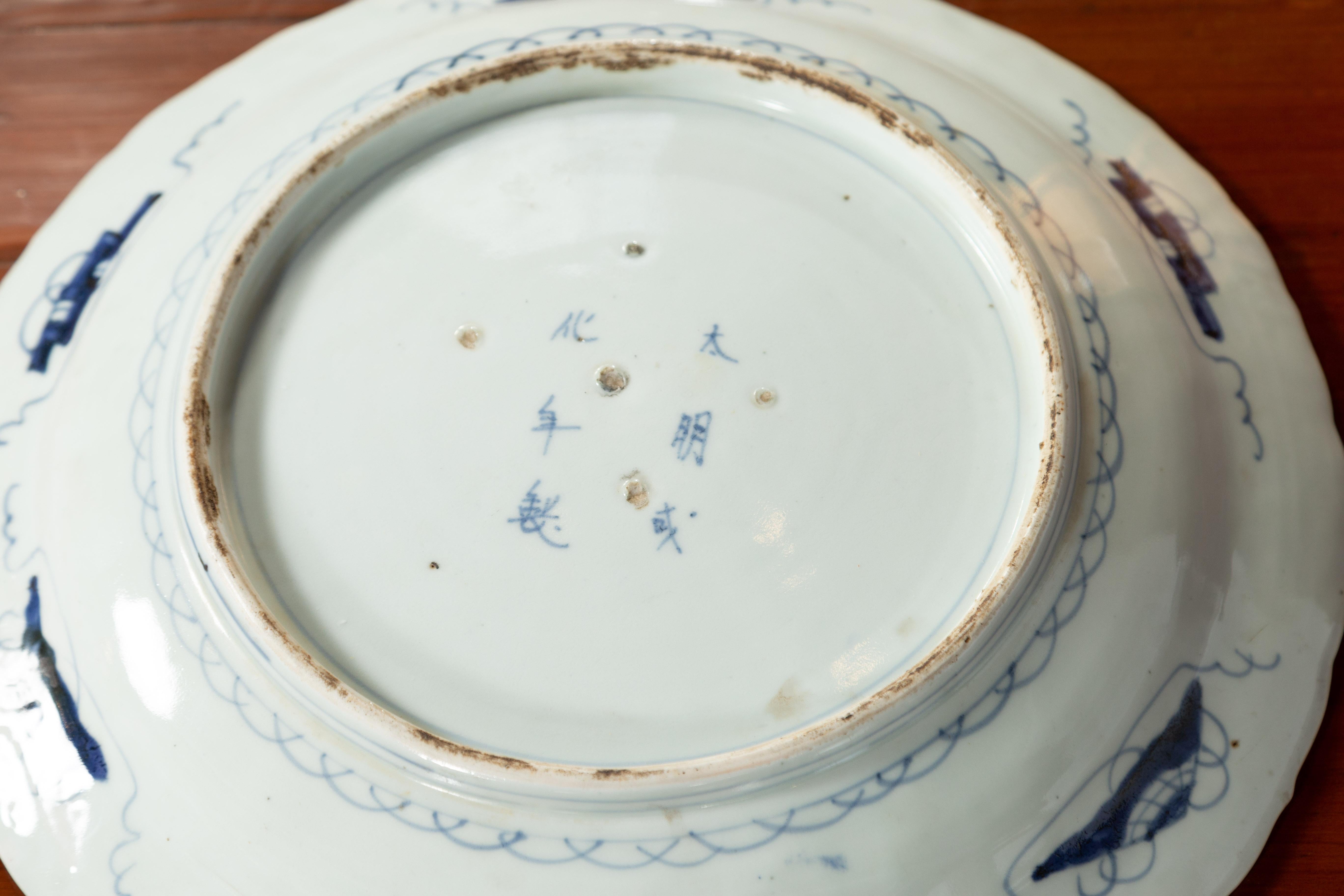 19th Century Japanese Porcelain Plate with Painted Blue and White Bird Décor For Sale 11