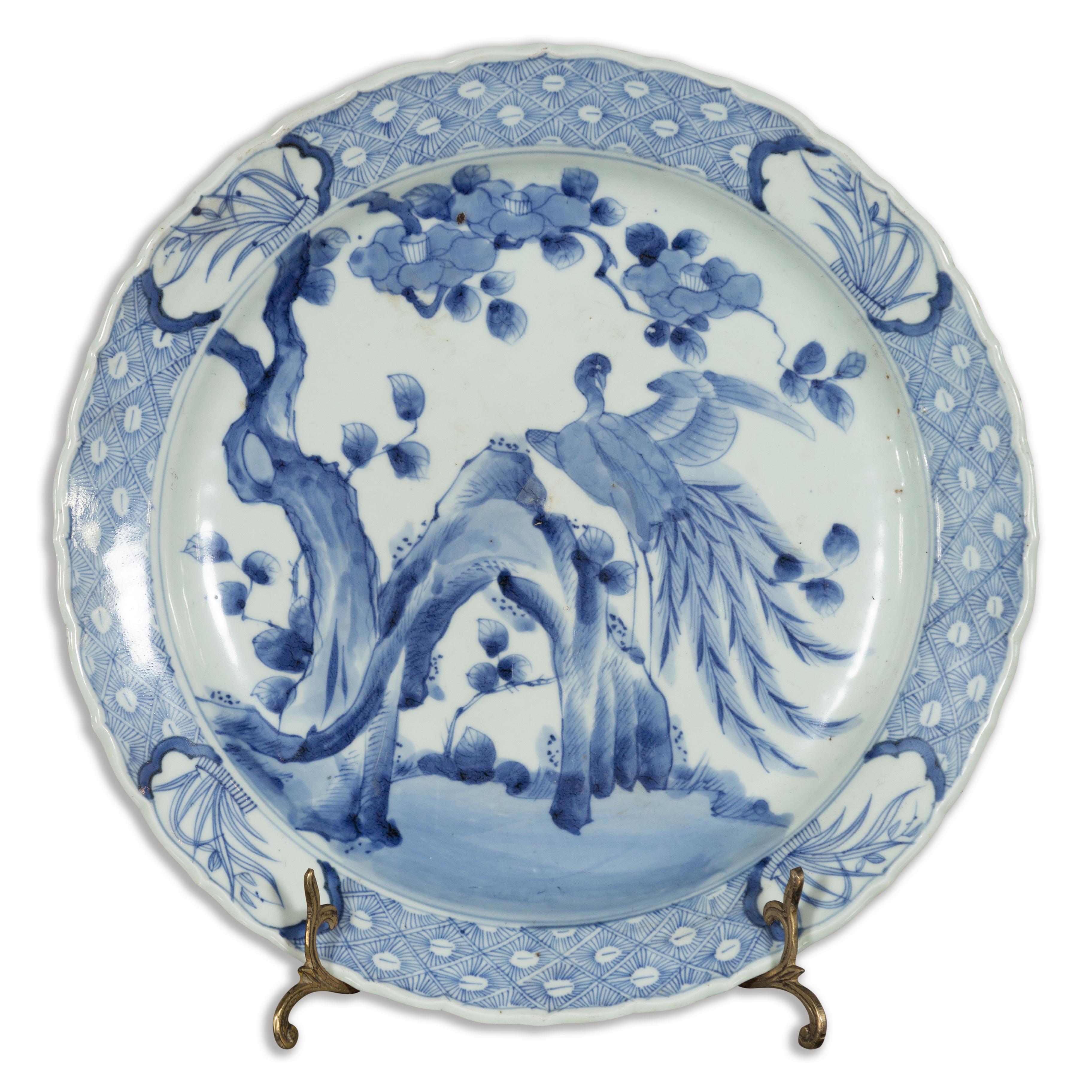 19th Century Japanese Porcelain Plate with Painted Blue and White Bird Décor For Sale 12