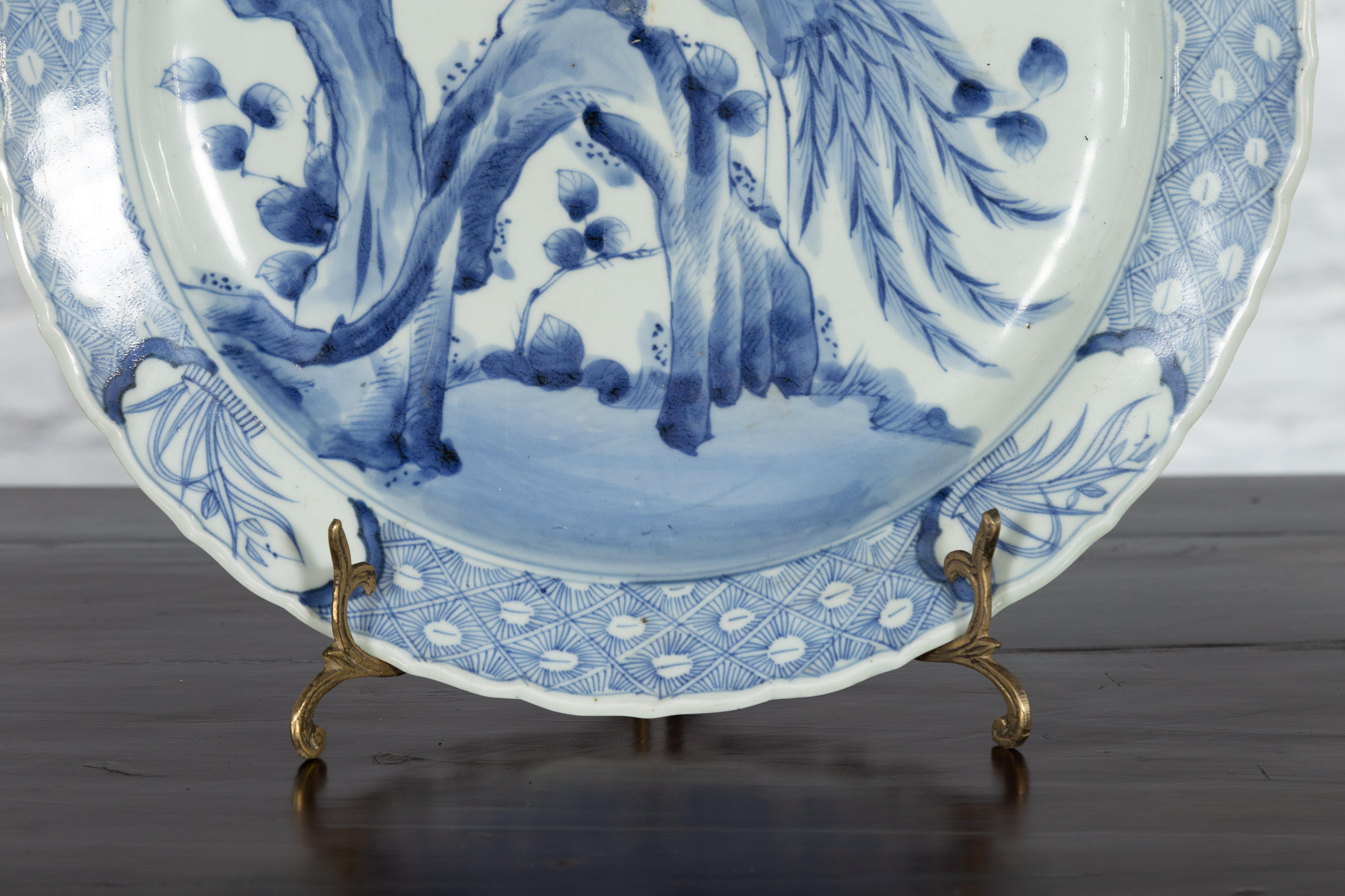 19th Century Japanese Porcelain Plate with Painted Blue and White Bird Décor For Sale 1