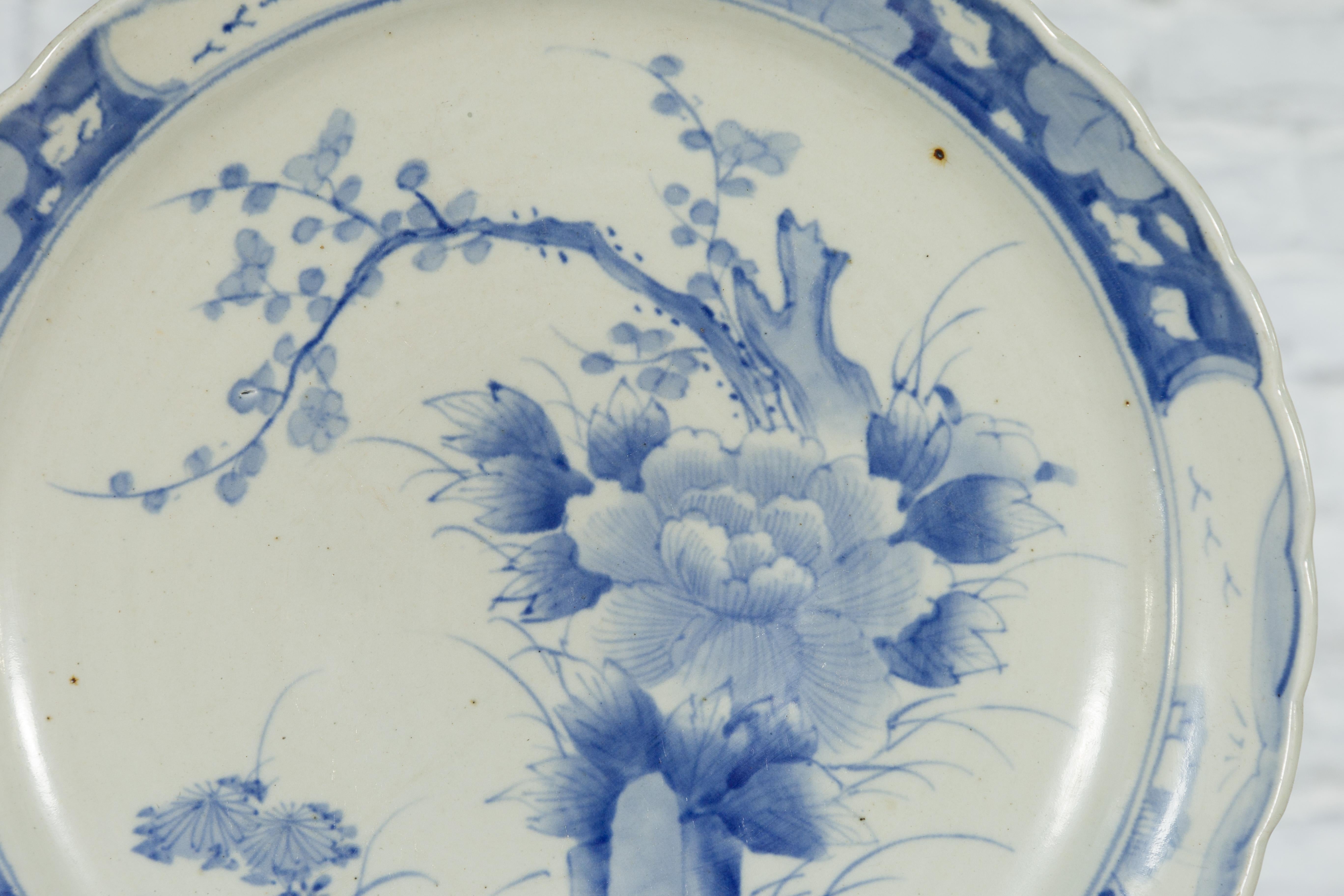 19th Century Japanese Porcelain Plate with Painted Blue and White Tree Décor For Sale 5