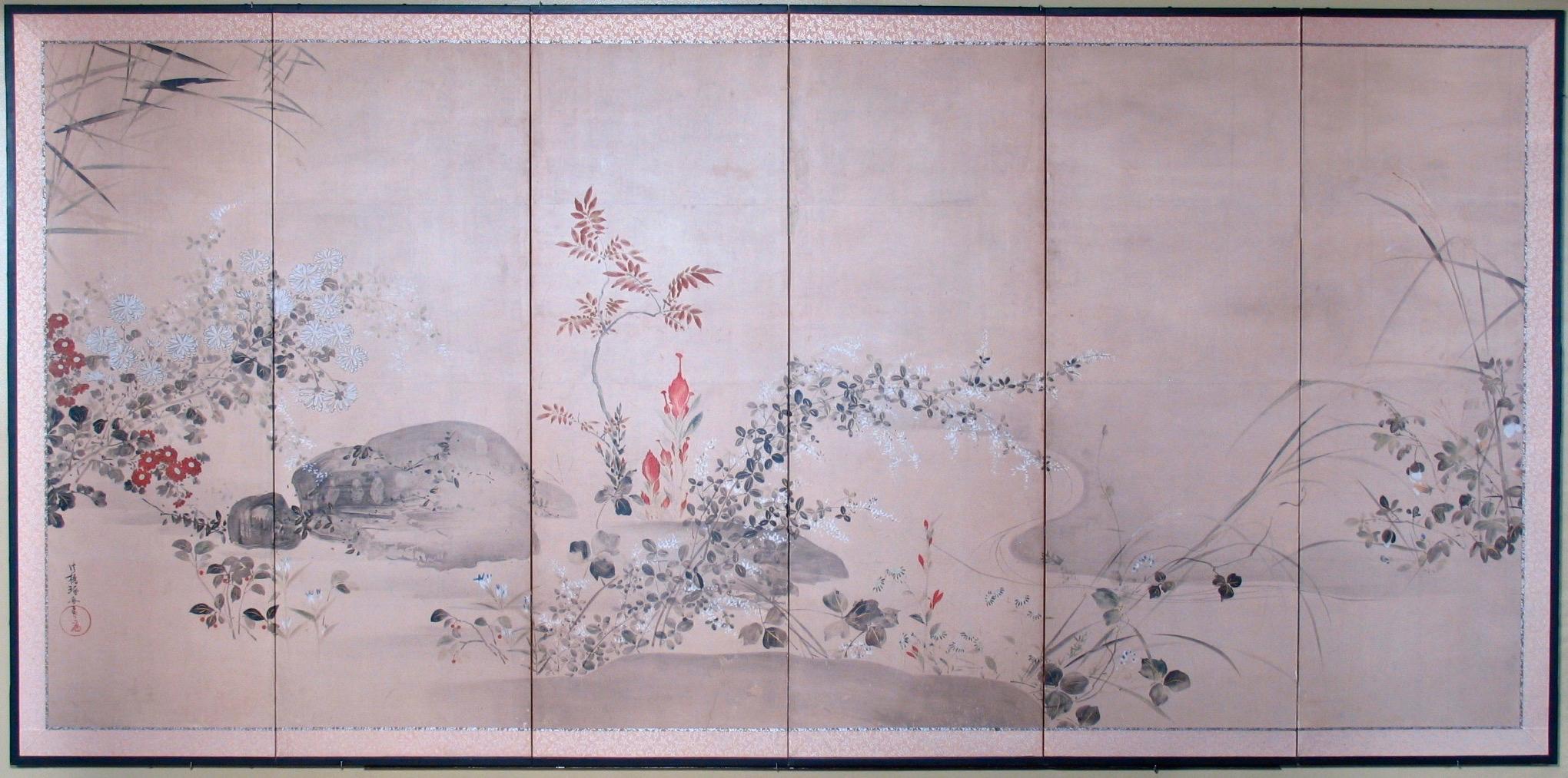 Antique Japanese Rimpa style 6-panel screen, featuring spring and autumn foliage on the banks of a meandering stream with a clump of red and white blossoming chrysanthemum extending over a small group or eroded rocks bordered by further flowering