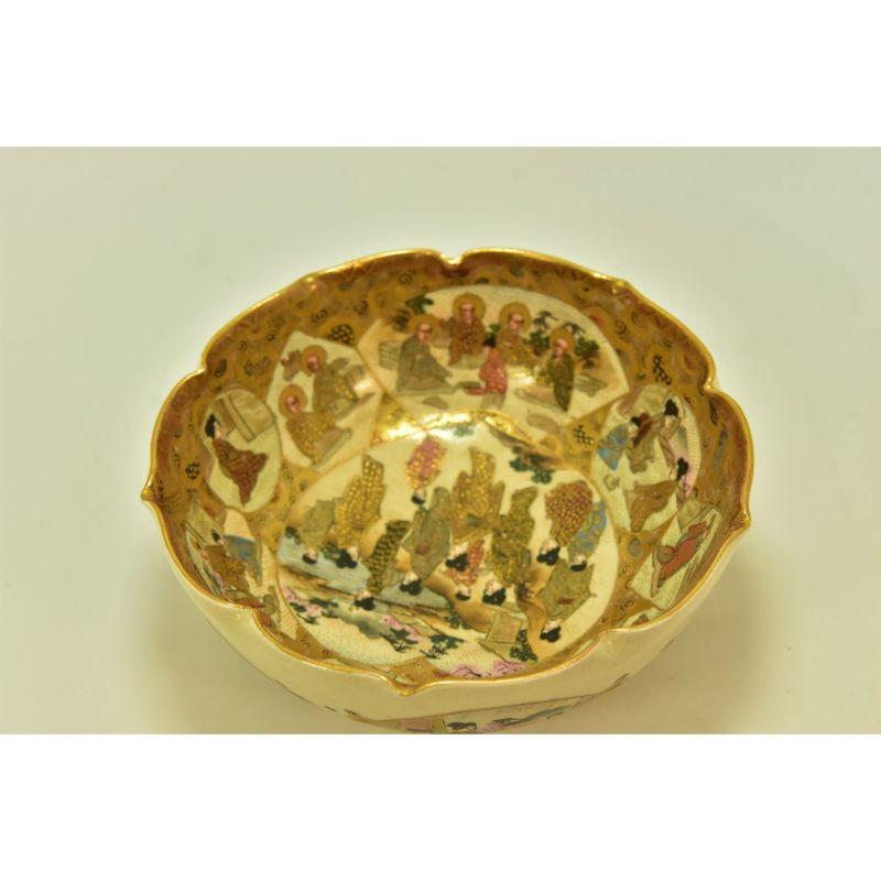 Multi-lobed Satsuma cup decorated with signature characters in gold on the bottom, dimension height 60 mm diameter 145 mm.

Additional information:
Material: Earthenware & Ceramics
Dimension: 14 W x 14 D x 6 H cm.
