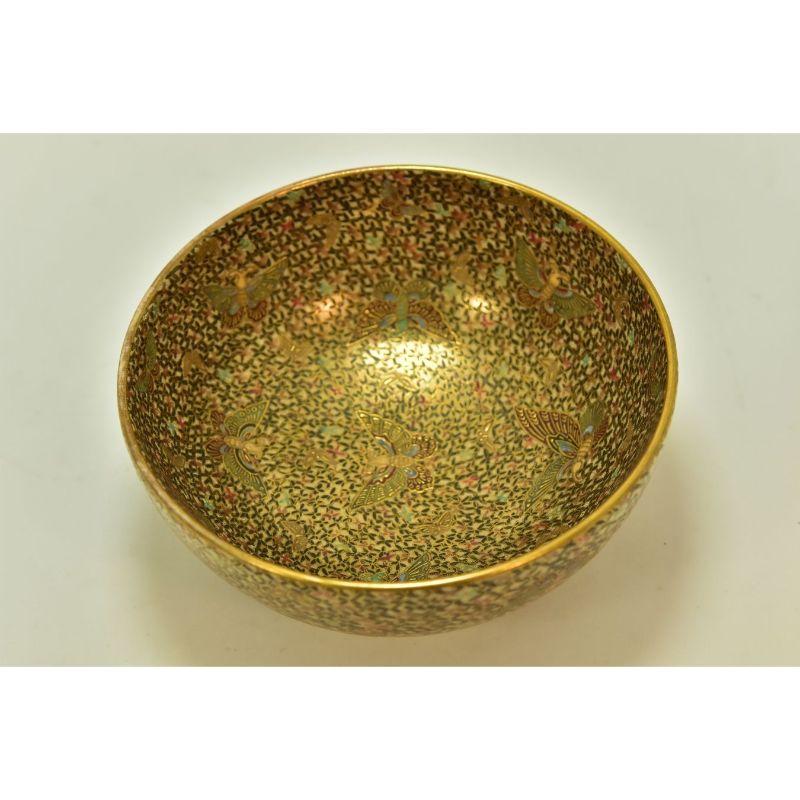 Satsuma cup with multicolored butterfly patterns signature in gold under the bottom dimension height 52 mm diameter 123 mm

Additional information:
Material: Earthenware & Ceramics
Dimension: 12 W x 12 D x 5.2 H cm.