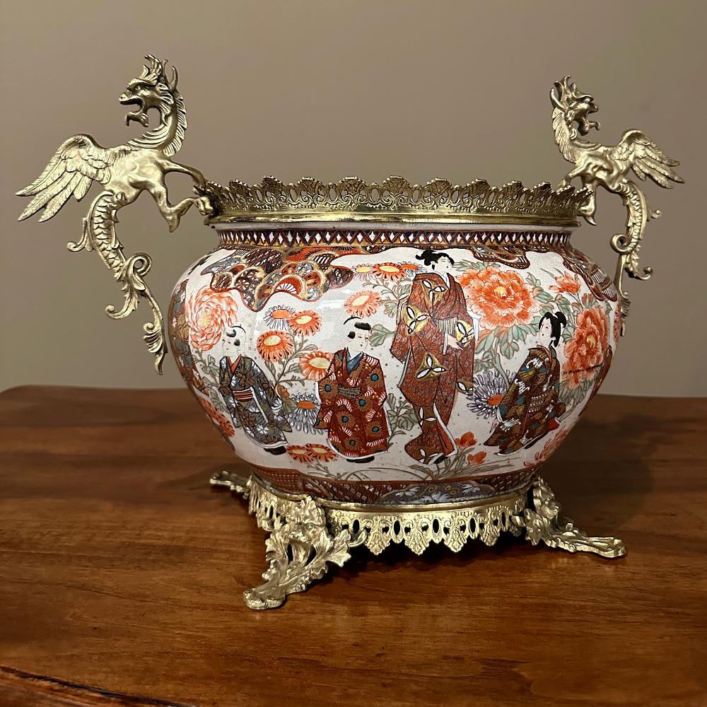 19th century Japanese Satsuma Vase ~ Jardiniere with Bronze Mounts is an amazing work of art with scenes hand-painted around the entire circle of the base creating a slightly different presentation as one views the piece from all angles. Such vases