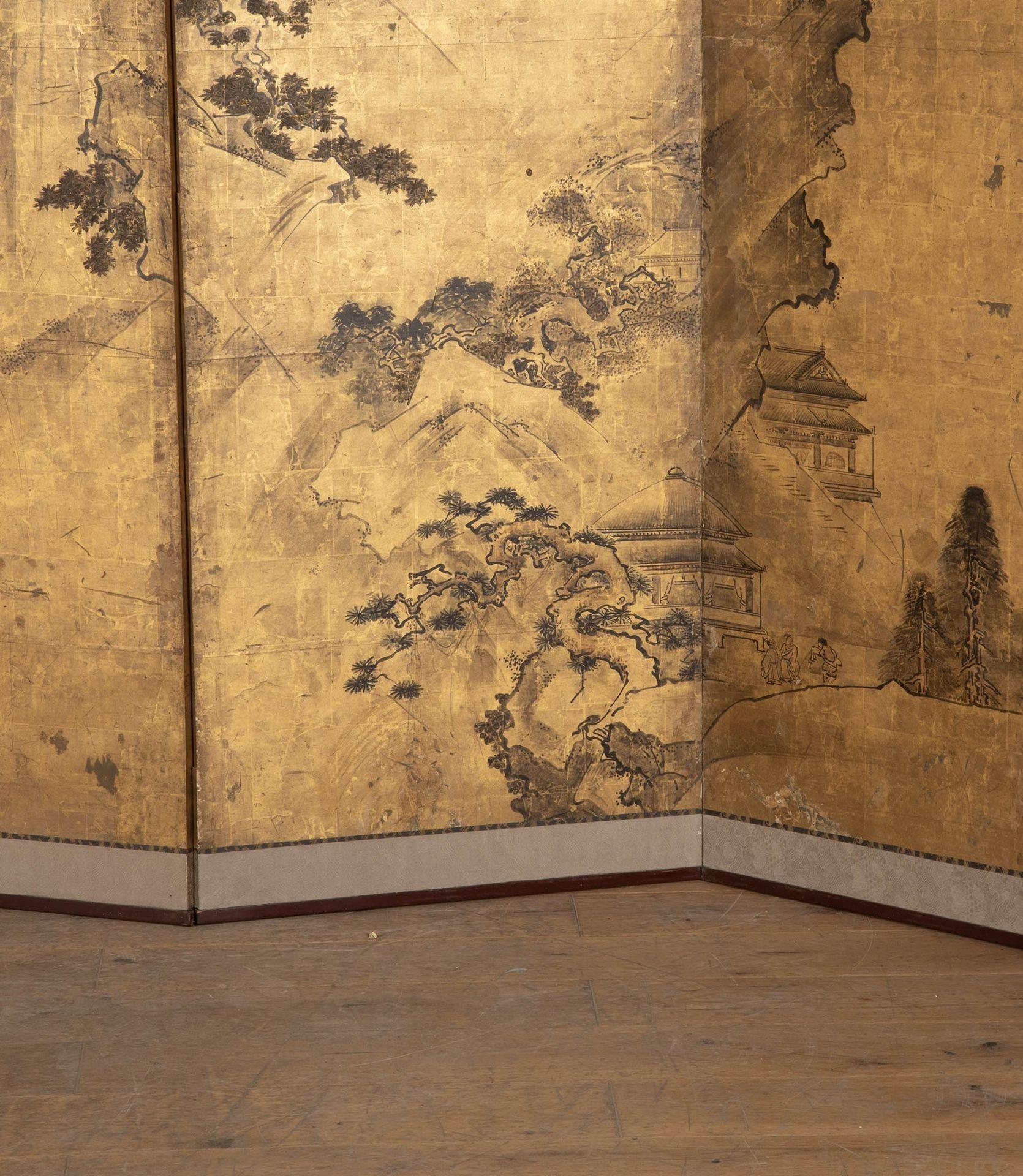 Mid-19th Century Japanese sixfold screen with atmospheric Nanga style painting.
Black ink over gold leaf on paper, of a peaceful mountainous landscape emerging from mist. In the foreground a wide river with sailboats and to one side a cliff with