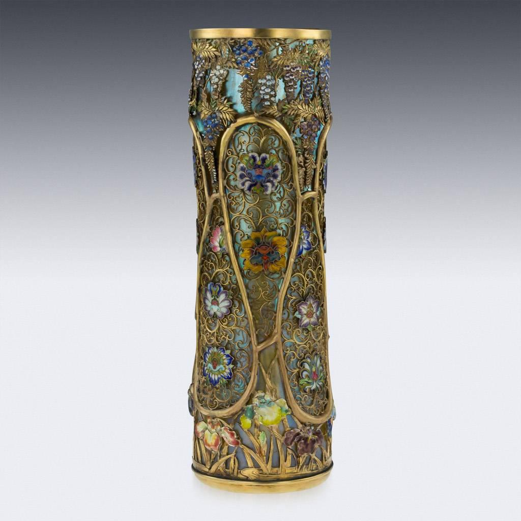 Antique late-19th century spectacular Japanese Meiji period Loetz blown glass vase with raised endless loops under an iridized silver blue finish, overlaid with an elaborate design of silver gilt scrolls mounted with finely enameled blossoms