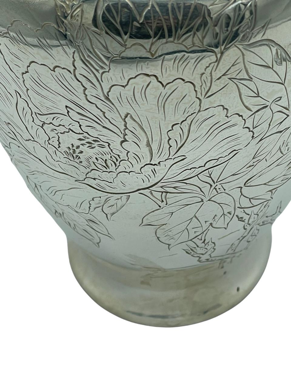 silver embossed vase