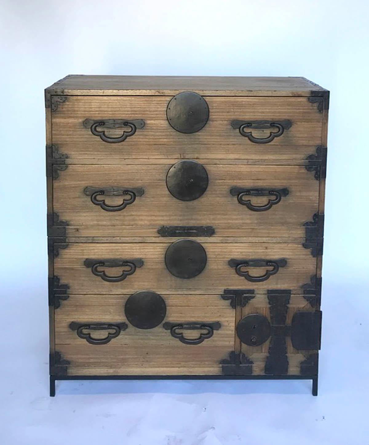 Very functional, hinoki wood Japanese tansu on custom iron base. This tansu has four drawers and one small compartment with two drawers. All original. Works as a chest of drawers or can be separated and used as nightstands or side tables. Smoothly