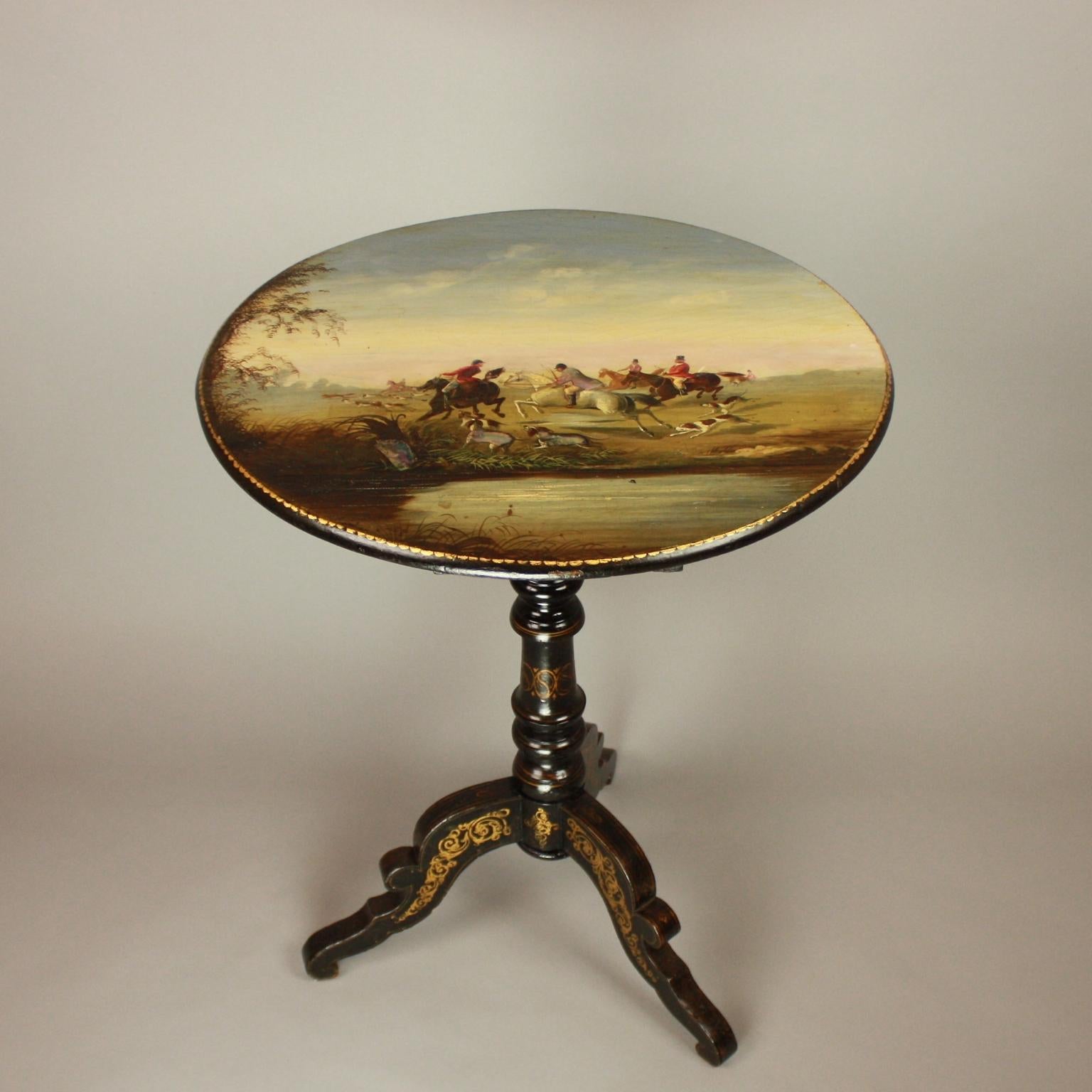 French 19th Century Napoleon III Japanned Salon or Side Table with Foxhunting Scene

A charming japanned tripod salon or side table with mother-of-pearl inset painted top depicting a fox hunting scene with horse riders in traditional hunt outfits