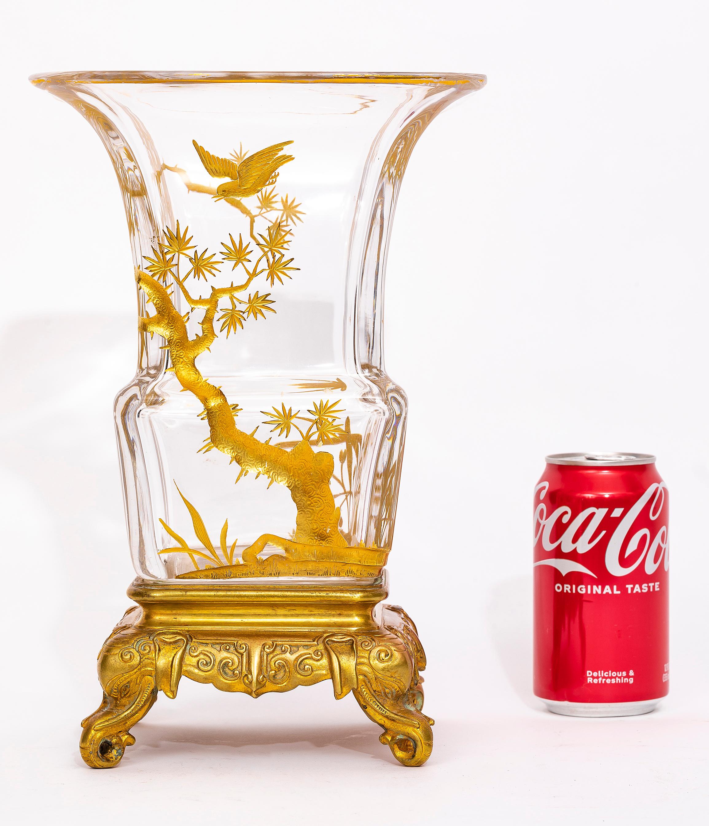 A Beautiful 19th Century Japonism Ormolu Mounted Signed Baccarat Crystal Vase, designed by E. Lievre. The vase features a rectangular form with gilt decoration. The design depicts two birds perched on a flowering branch, with birds symbolizing