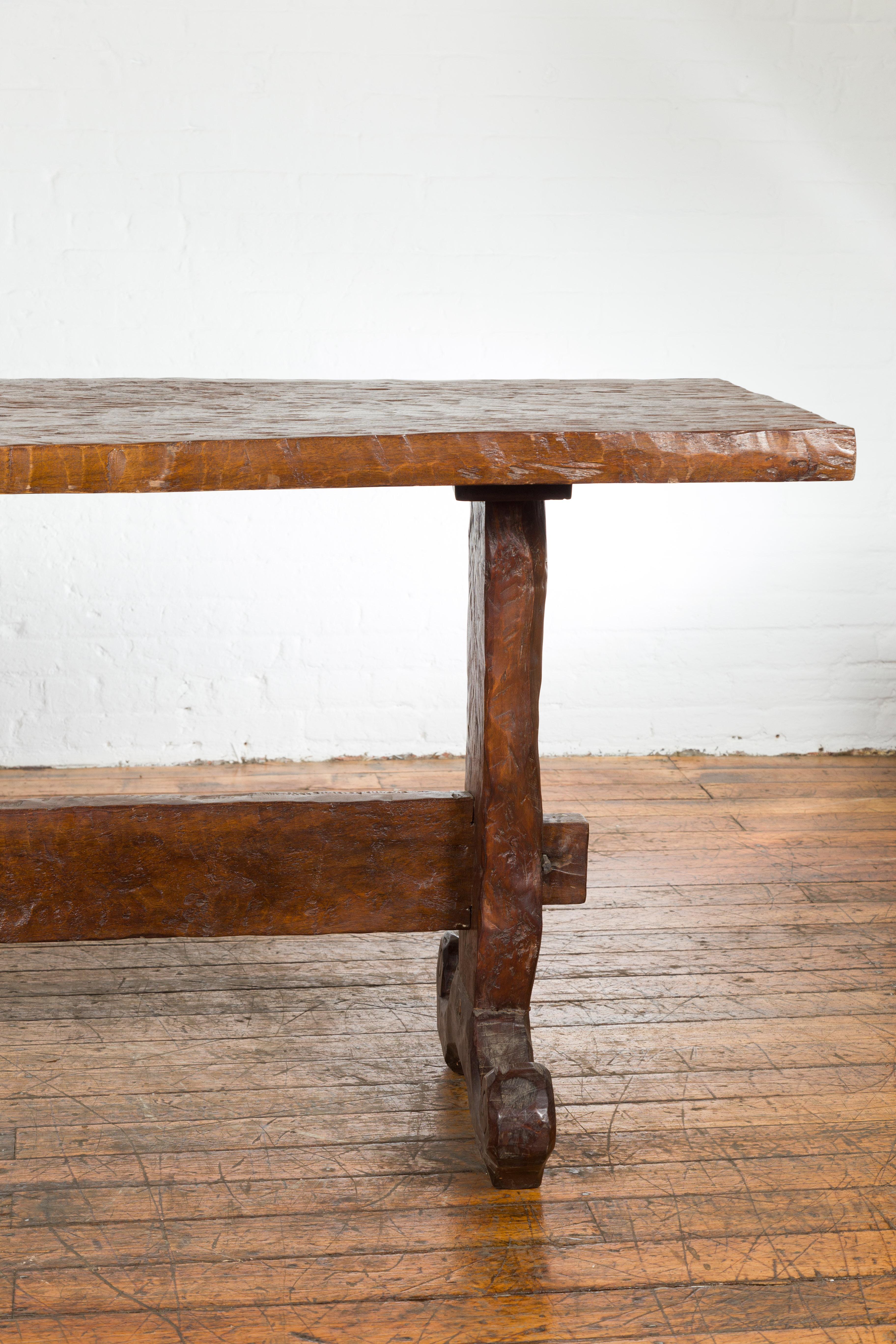 Carved 19th Century Javanese Wood Console Table with Trestle Base and Rustic Character