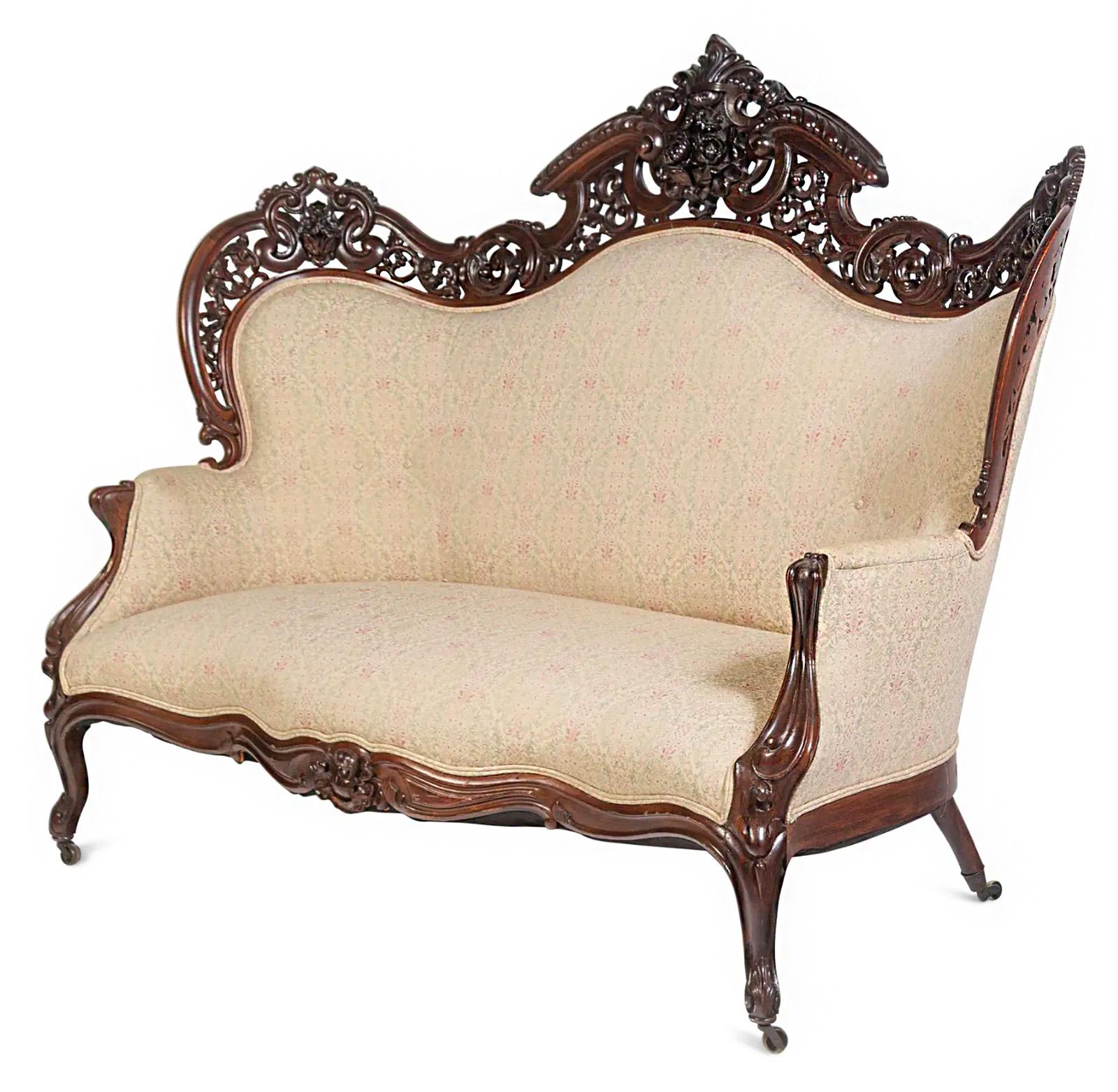 A carved rosewood sofa made by Joseph Meeks and Sons circa 1860.

Dimensions: 50.5