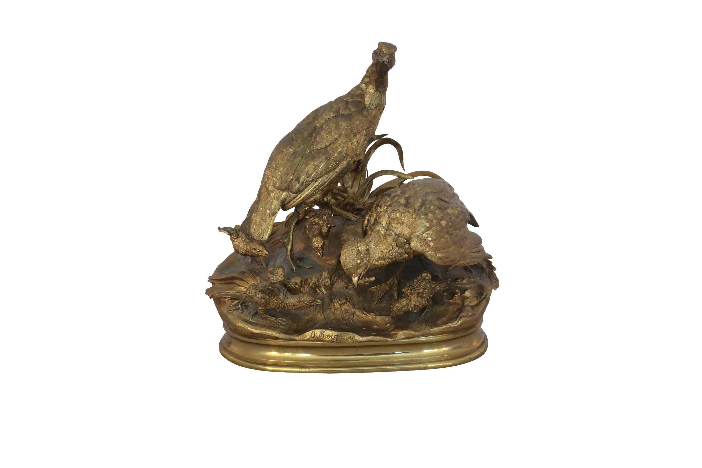 Sculpture ancienne en bronze représentant une famille de perdrix par Jules Moigniez, 19e siècle. Exquisément ciselé et coulé, comme c'est presque toujours le cas pour les œuvres de Moigniez, ce bronze de cabinet est plein de vie et de mouvement. La