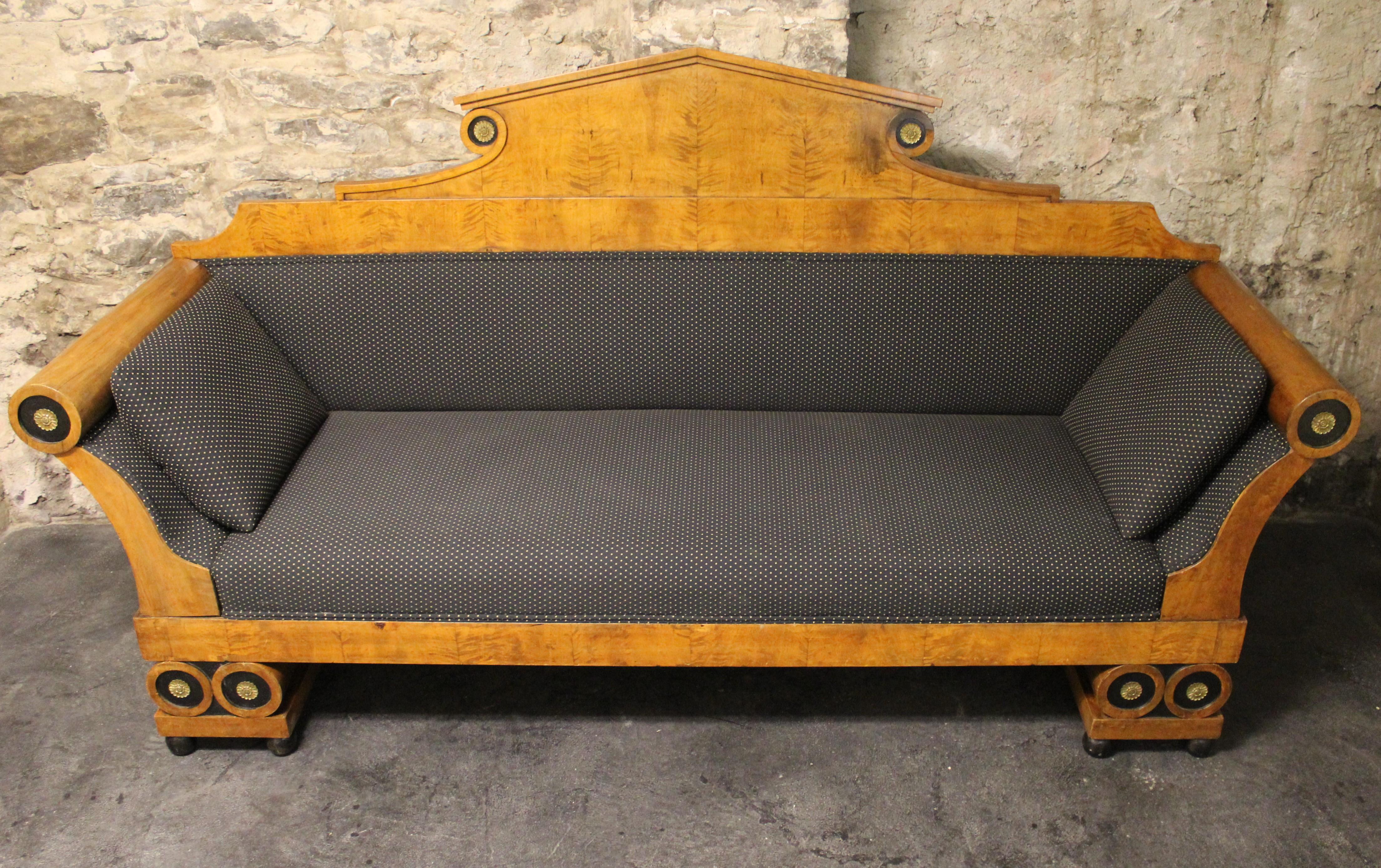 19th century Karl Johan Biedermeir sofa with upholstered seat in the empire form with bronze roundel mounts, bolstered sides and legs.