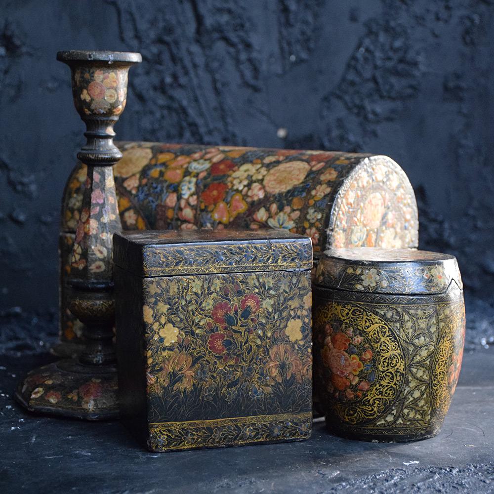 19th century Kashmir Papier Mache Collection 

A delightful collection of late 19th and early 20th century papier Mache hand painted Kashmir objects. Including a small tobacco jar, brass feet letter casket, card box and candle stick. The letter