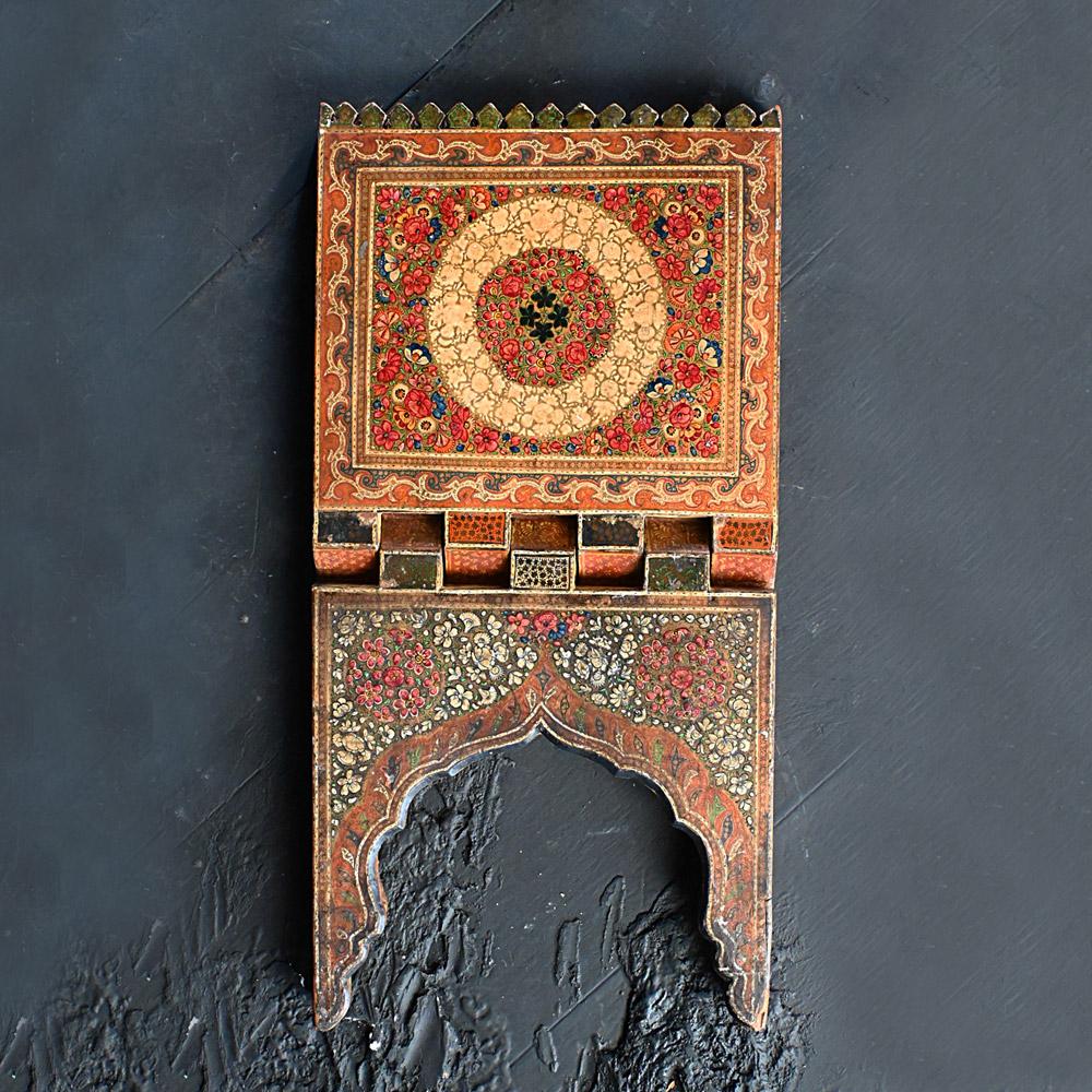 19th Century Kashmiri Islamic scripture stand 

An outstanding example of a Mid-19th Century Kashmiri hand painted holy scripture stand. A similar example can be found in Copenhagen at the David Collection of fine Islamic Arts. This fine piece of