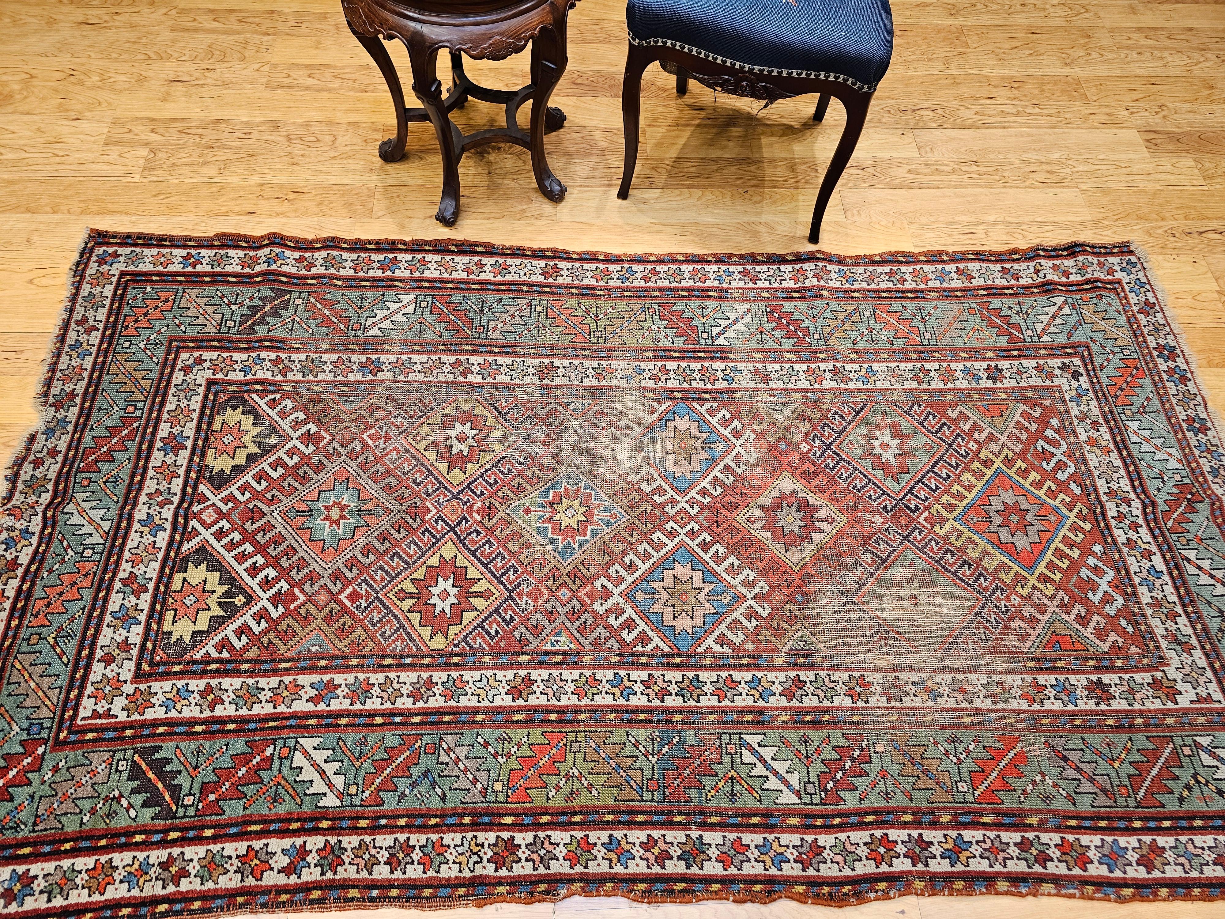 Tapis Kazak du 19e siècle en rouge, vert, bleu, jaune et ivoire en vente 9