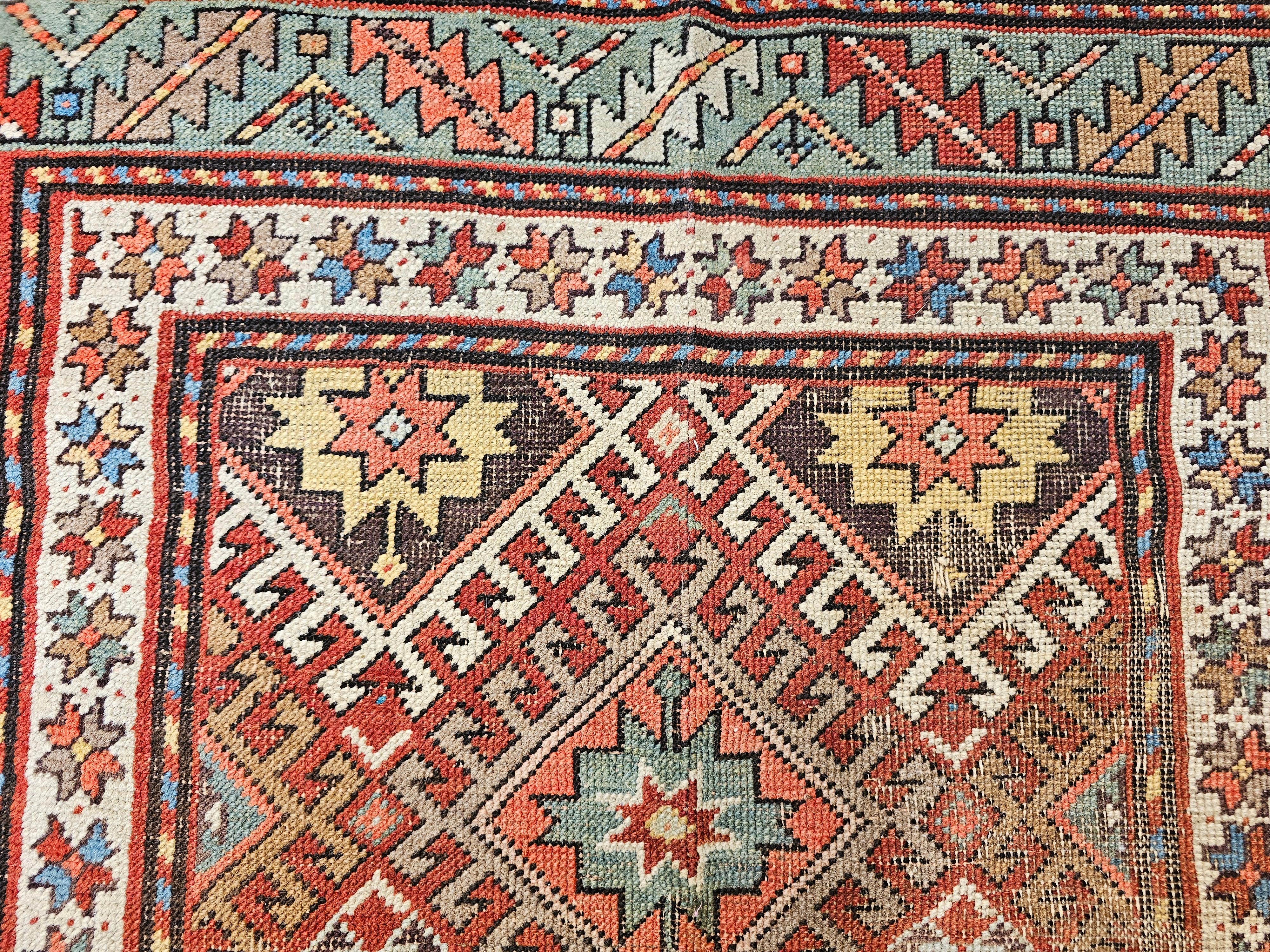 Laine Tapis Kazak du 19e siècle en rouge, vert, bleu, jaune et ivoire en vente