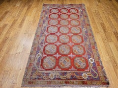 19th Century Khotan Area Rug with Allover Pattern in Red, Lavender, Ivory