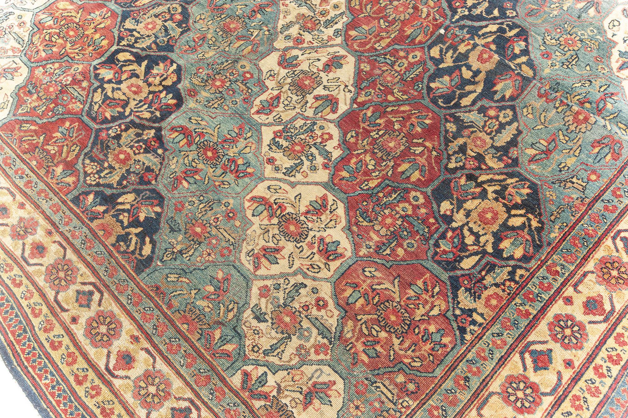19th Century Kirman Red, Blue Handwoven Wool Rug In Good Condition For Sale In New York, NY