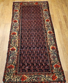 19th Century Kurdish Gallery Rug in All Over Paisley & Poppy Motifs