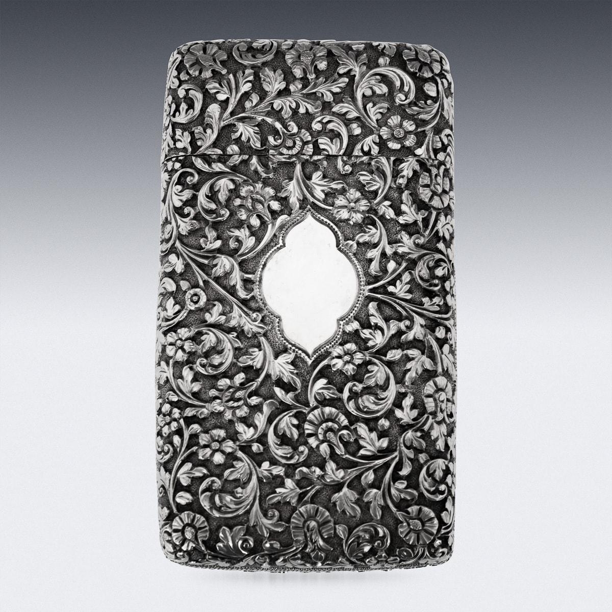 Antique late-19th Century Kutch hand-crafted solid silver cigar case. Of rectangular form with rounded edges, finely chased throughout with scrolling leaves and floral patterns on a finely tooled matted ground. This case is particularly fine