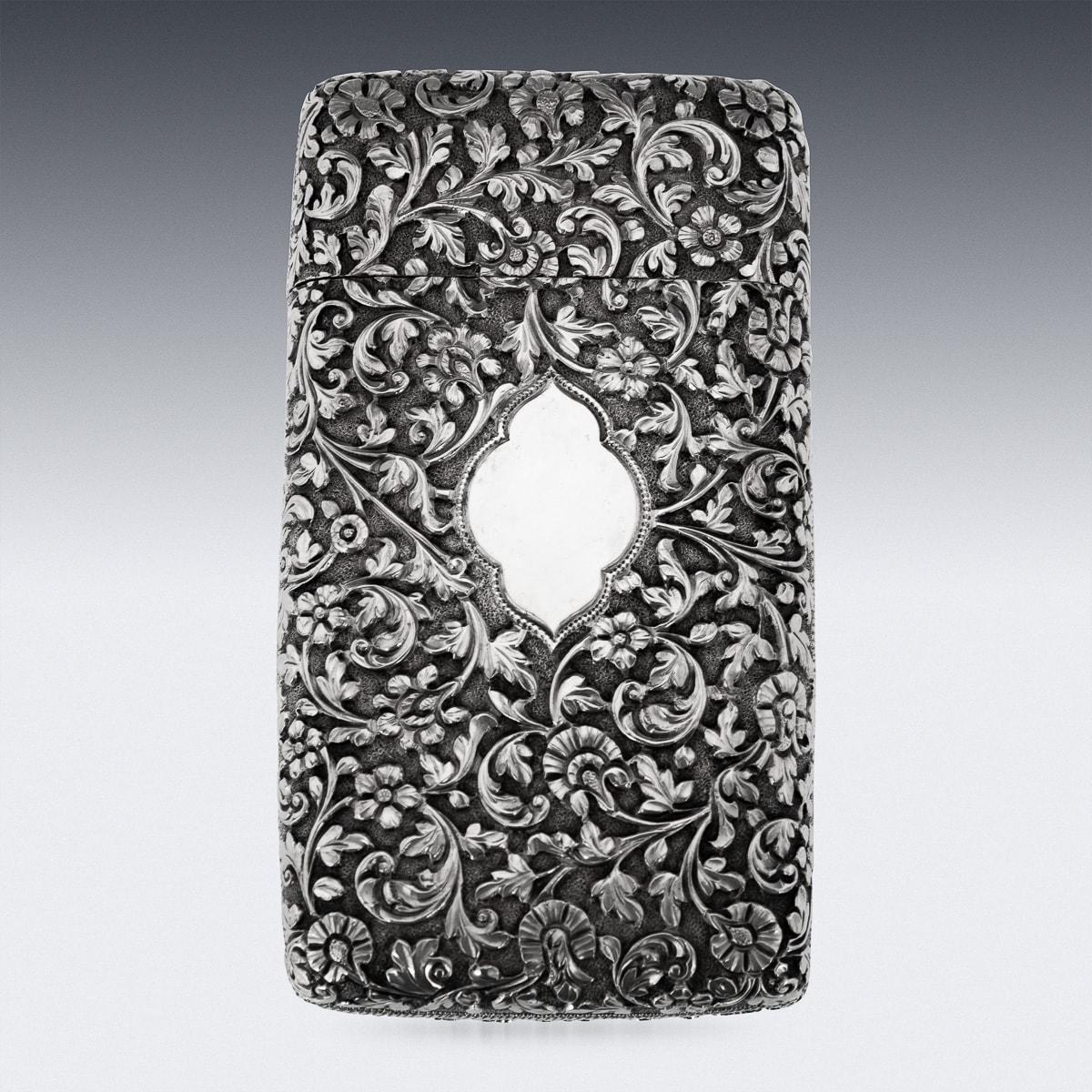 Antique late-19th Century Kutch hand-crafted solid silver cigar case. Of rectangular form with rounded edges, finely chased throughout with scrolling leaves and floral patterns on a finely tooled matted ground. This case is particularly fine