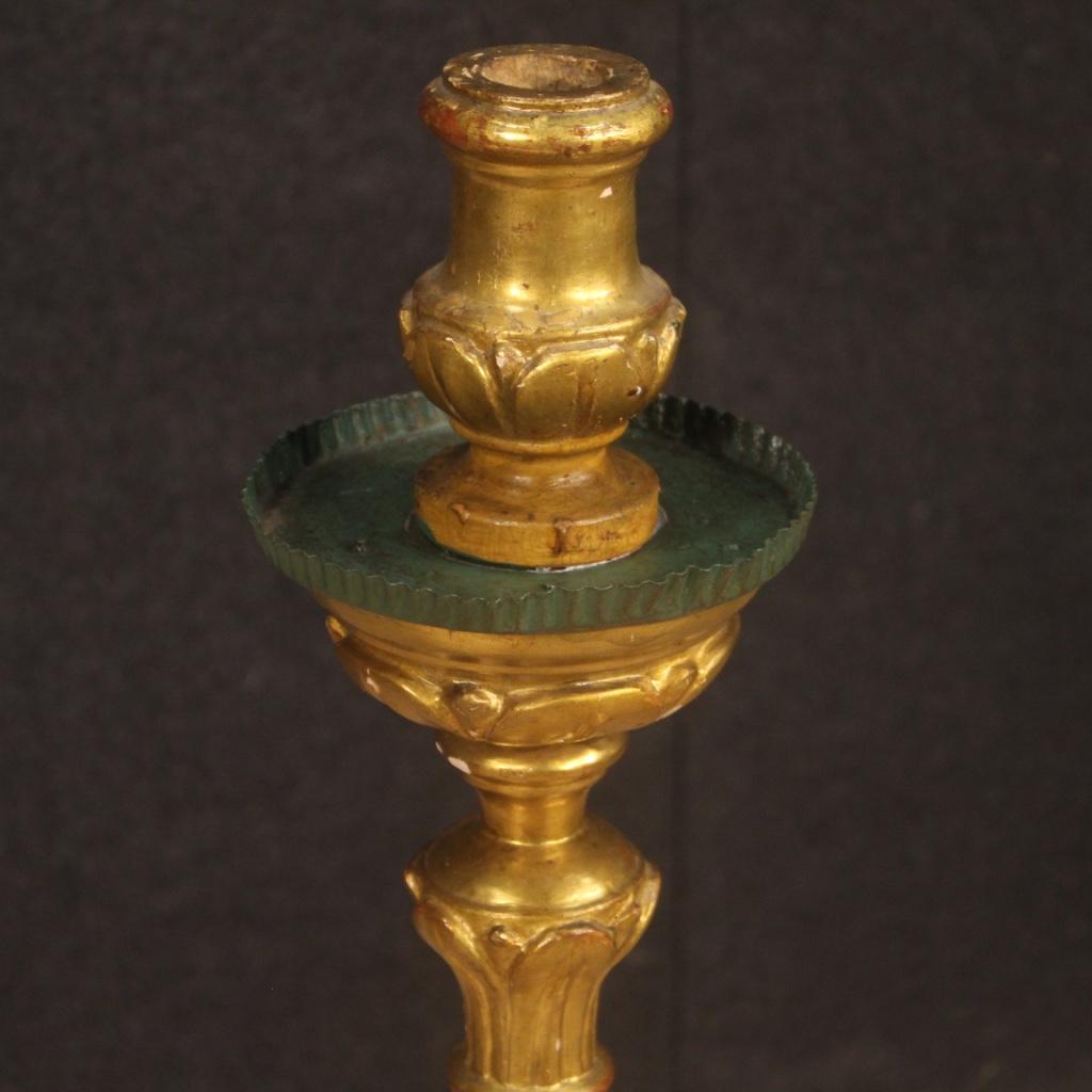 Italian torch holder from 19th century. Pleasantly carved, lacquered and gilded wooden and plaster object, pleasantly furnished. Large size candleholder, for antique dealers and collectors, complete with small metal tray for wax. Torch holder which