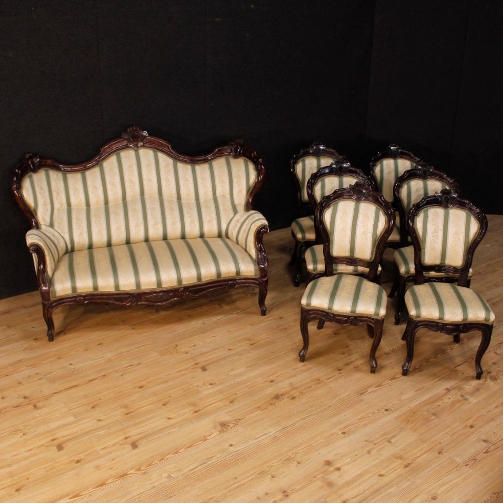 Italian sofa from late 19th century. Furniture of particular construction and Louis Philippe line in lacquered and painted wood Palisander dye. Sofa of great size and impact covered in fabric with floral decorations (see photo). Furniture finished