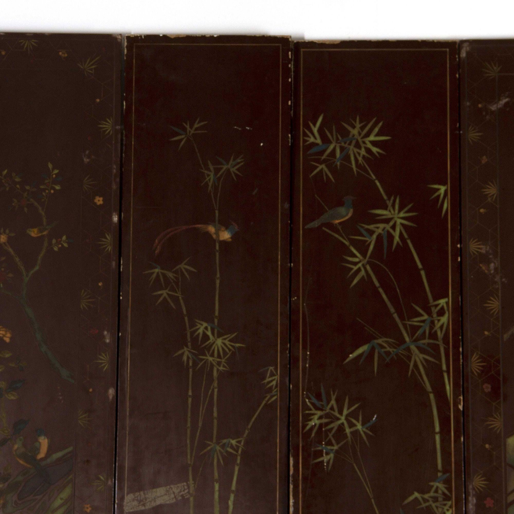 Monumental 19th Century lacquered screen with a Chinoiserie design throughout. 
This fantastic screen features ten folding panels which are decorated on both sides. Each panel is beautifully painted with typical Chinese foliate designs and social