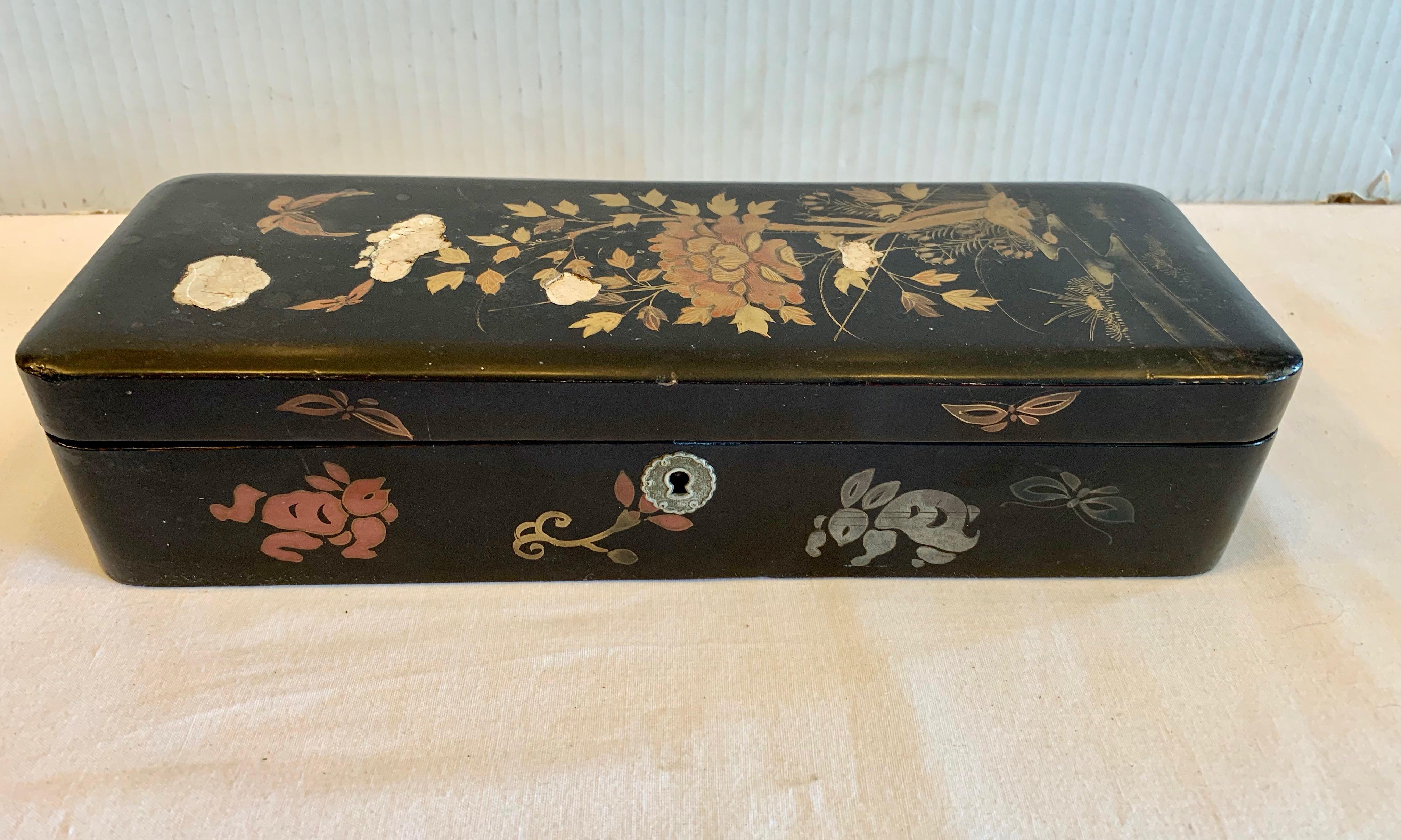 Exquisitely fine pen work with florals and foliage.
The box is appointed with mother -of - pearl inlays.
It decorated on all 4 sides, as well; and appointed with a butterfly hovering
above the florals