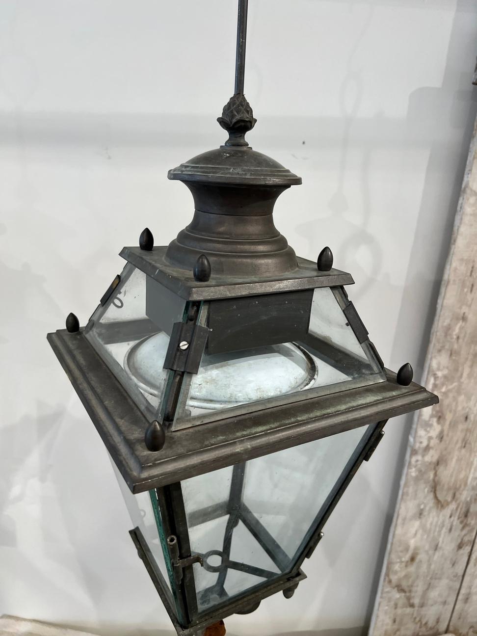 These lanterns were created in Genoa, which has a famous landmark, Lanterna di Genova (Lighthouse of Genoa); many consider this lighthouse to be a symbol of the city. These lanterns would look regal in front of your home. 
Must be rewired for US