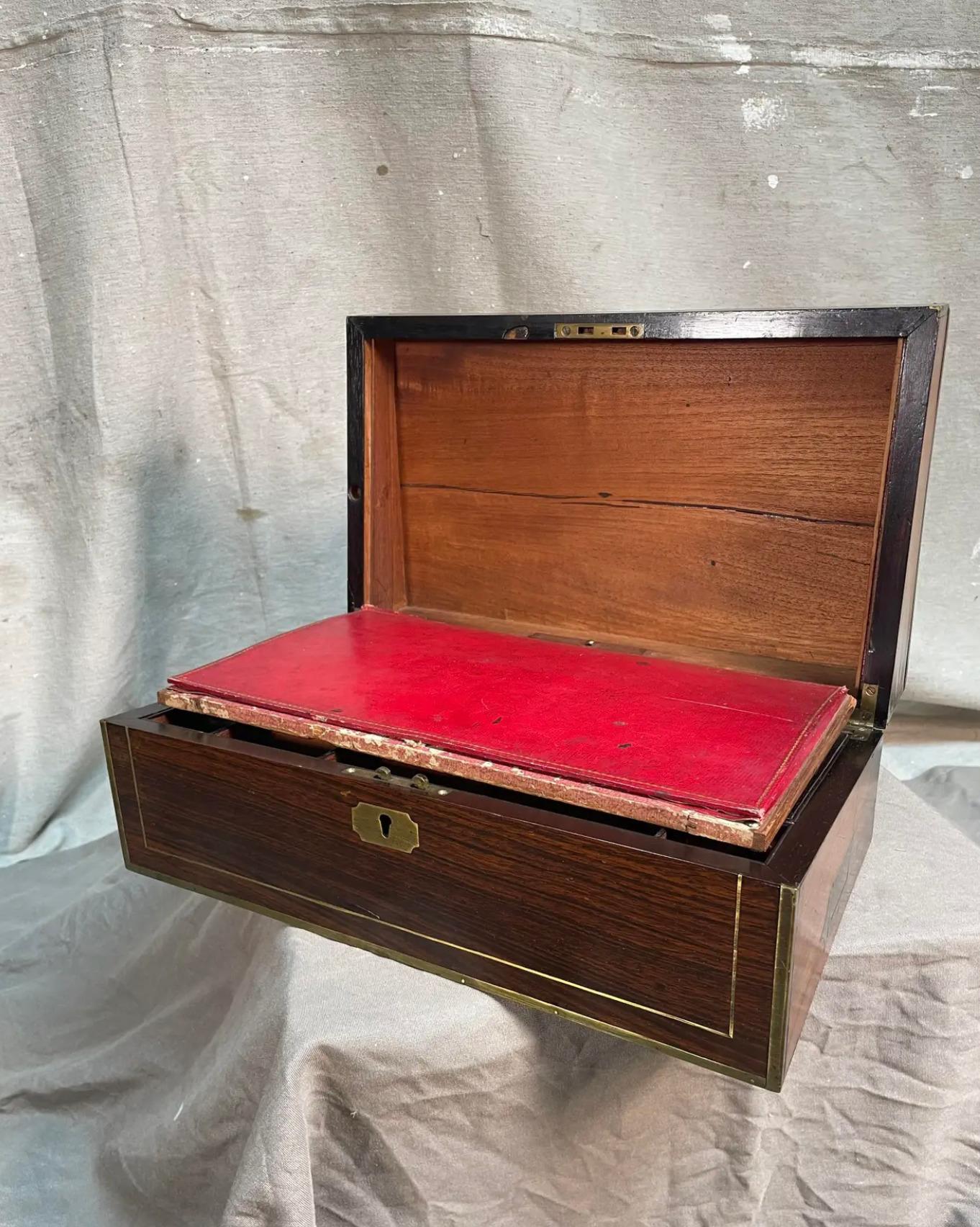 This 19th century laptop is also known as a writing slope, or a lap desk! It became wildly popular in the 19th century because a 