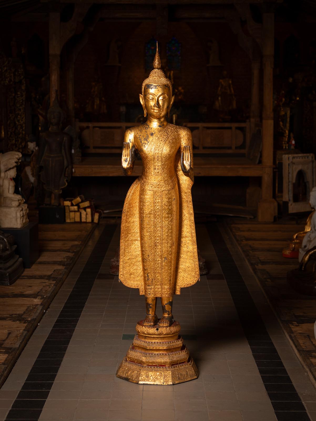 Large antique bronze Thai Buddha statue

Material : bronze
178 cm high
44 cm wide and 43 cm deep
Gilded with 24 krt. gold
Rattanakosin style
Abhaya mudra
19th century
The Buddha is removable from the pedestal.
Estimated weight : +/- 150 kilo
Very