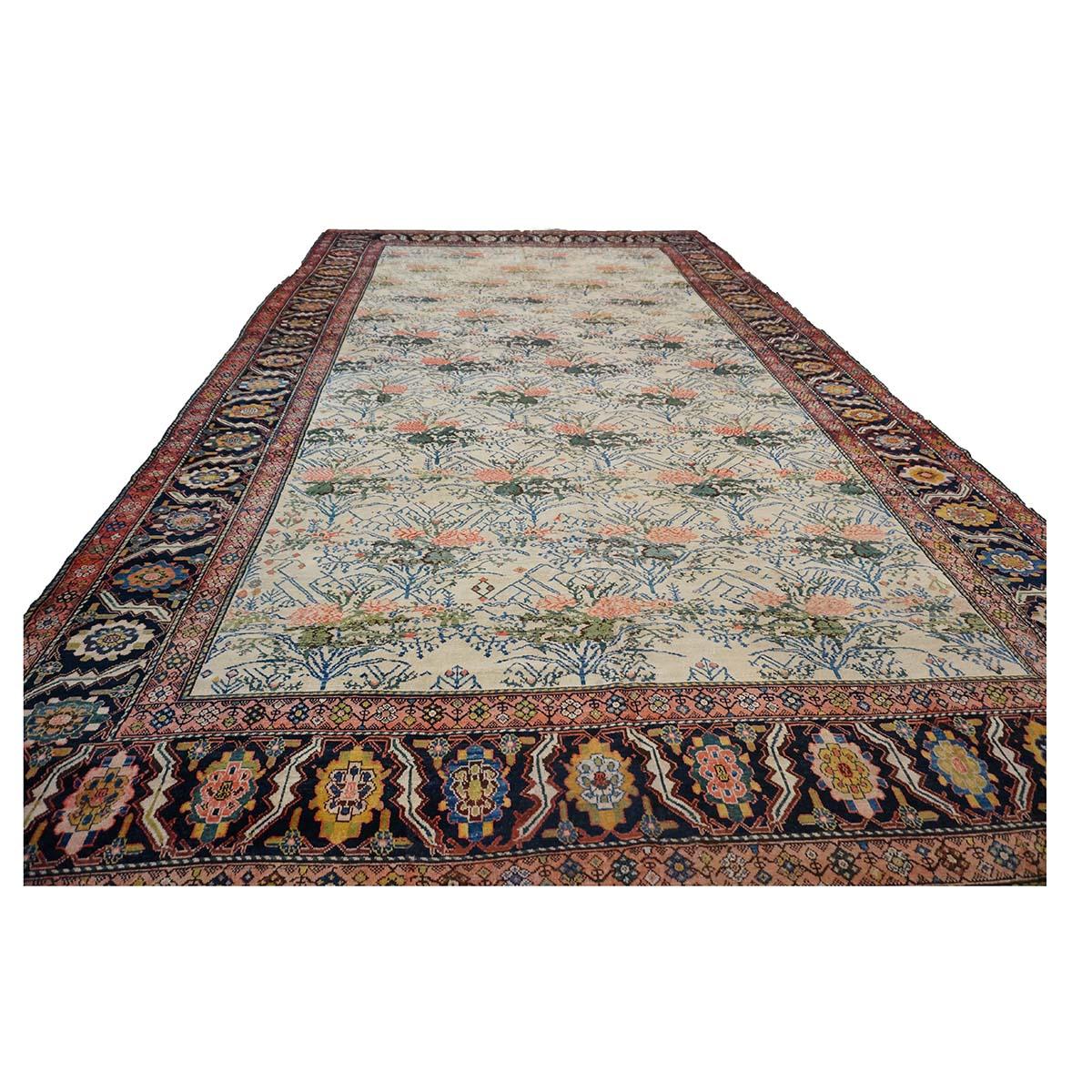 Ashly Fine Rugs Presents an unusual Antique Persian Malayer with a typical border found in Malayer carpets but the most unusual field design that resembles rugs of Bijar with the Golfarang (European flower) This rug has a good quality weave with no