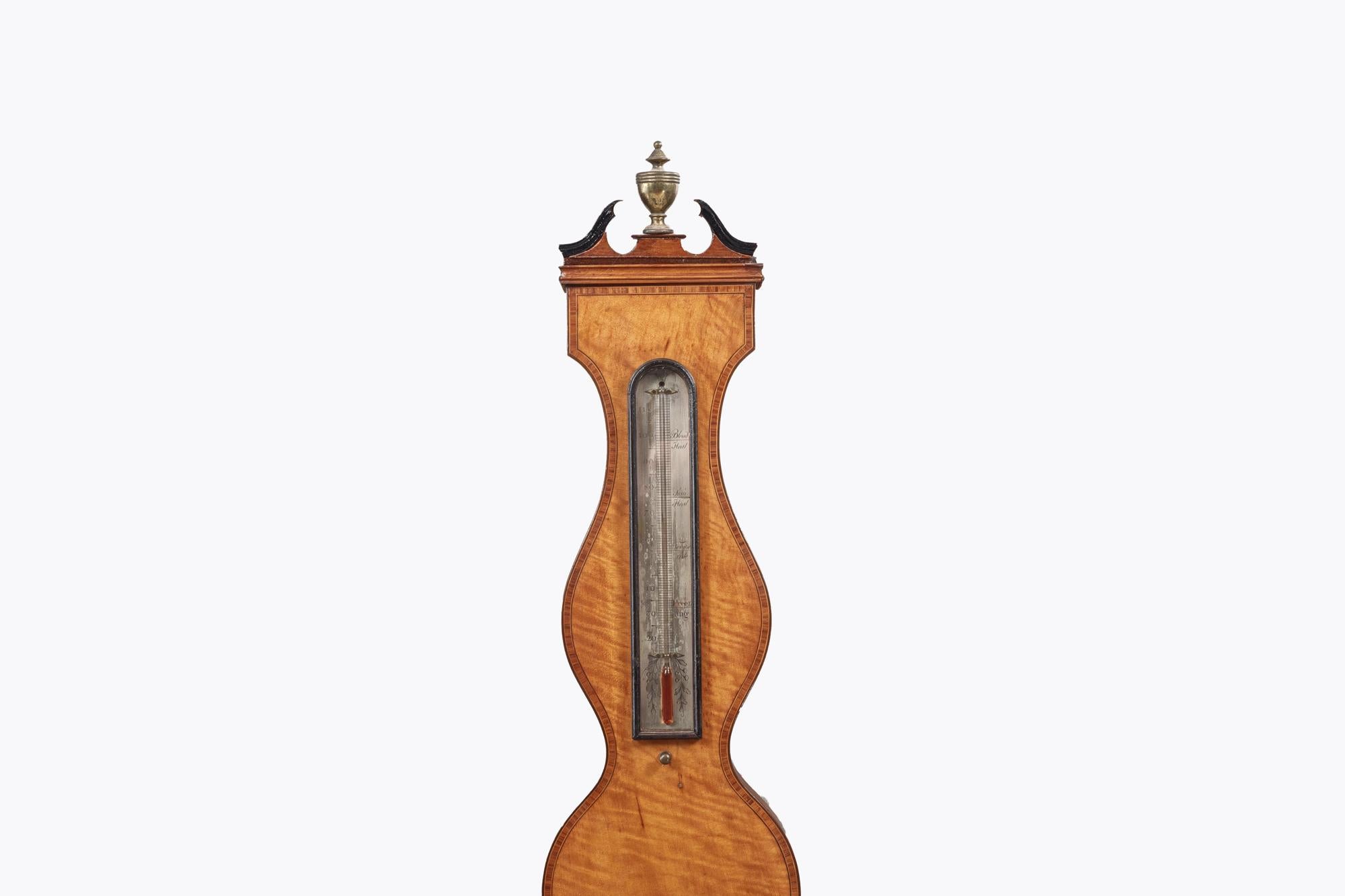 19th Century large barometer made in London by Thomas Rubergall, who was the Queen Victoria’s optician. The face of the barometer features engraving reading ‘Tho(s) Rubergall, Optician to the Queen, 24 Coventry Street, London’. Held in a shaped