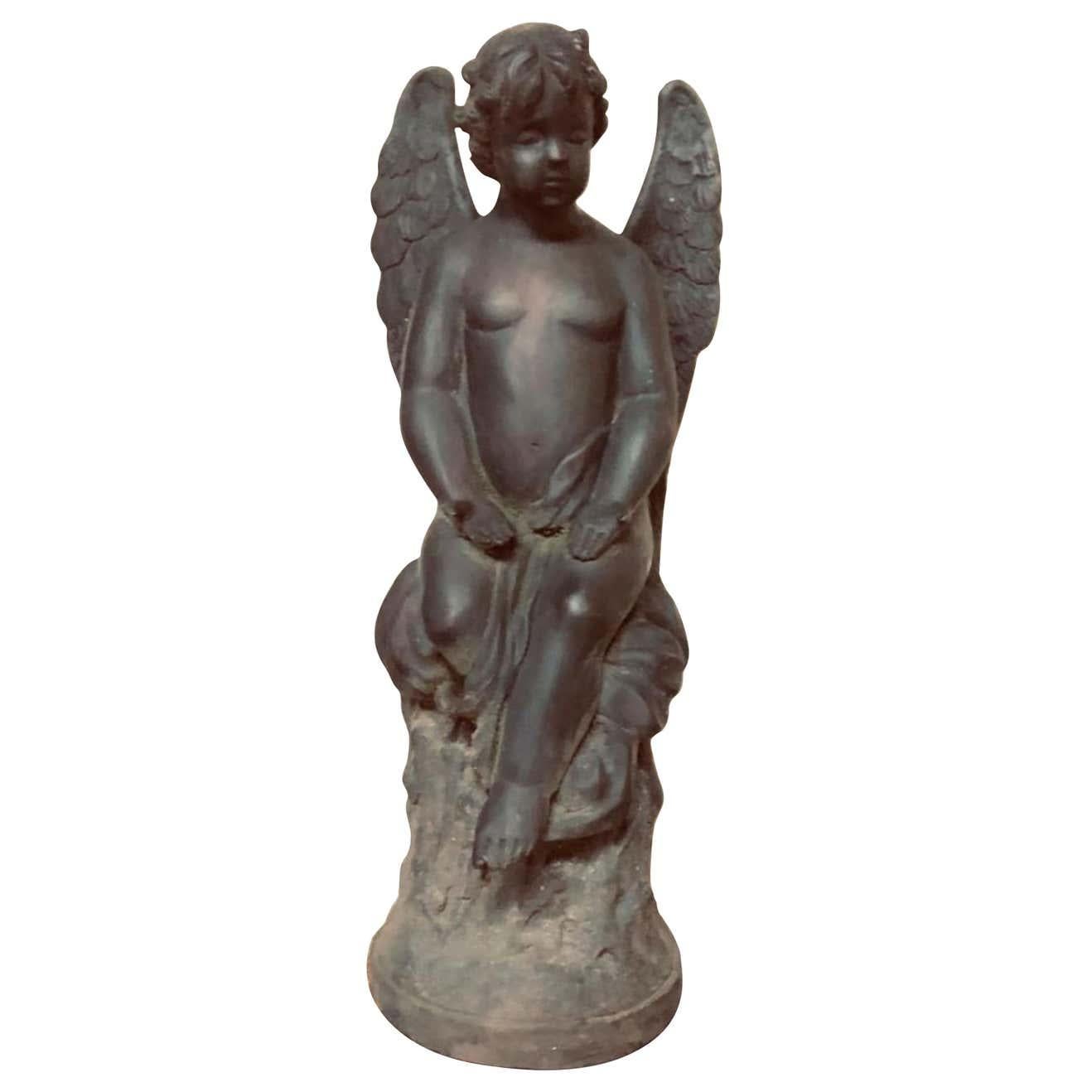 A beautiful 19th century large bronze angel with wonderfully aged patina. Perfect as garden furniture or home decoration.