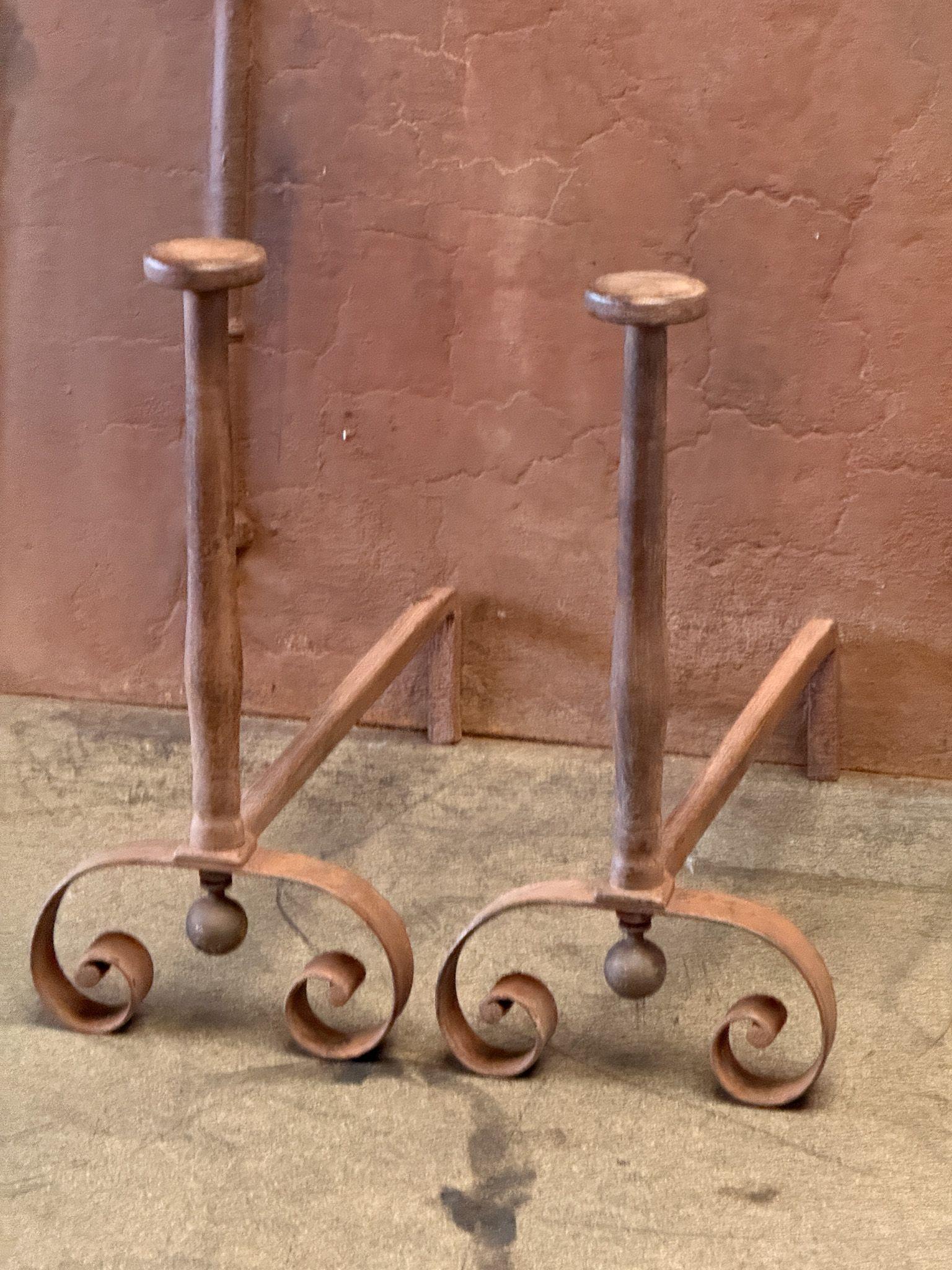 19th century French Victorian Period fire dogs made of wrought iron. These French andirons are called 'landiers' in France. The condition is good.
