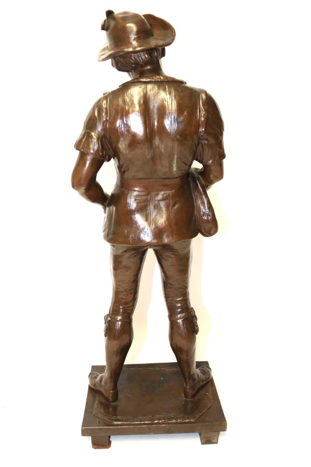 This large and impressive bronze sculpture of Robin Hood was produced in France in the mid-19th century by Louis Joseph Le Boeuf, an artist born in 1823-1867.

This bronze depicts Robin Hood standing with a money bag over one arm and wearing a