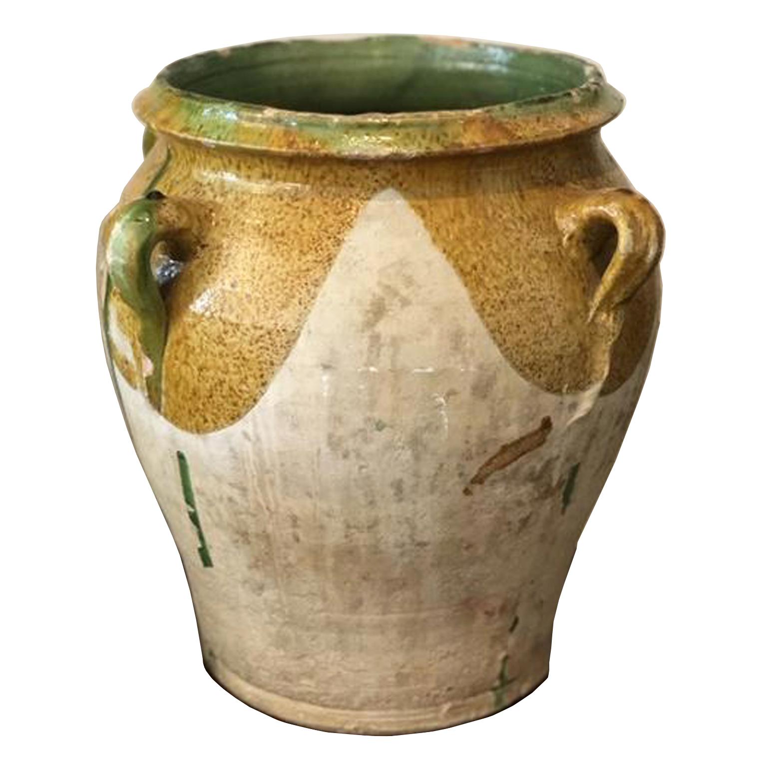 large terracotta urn with handles
