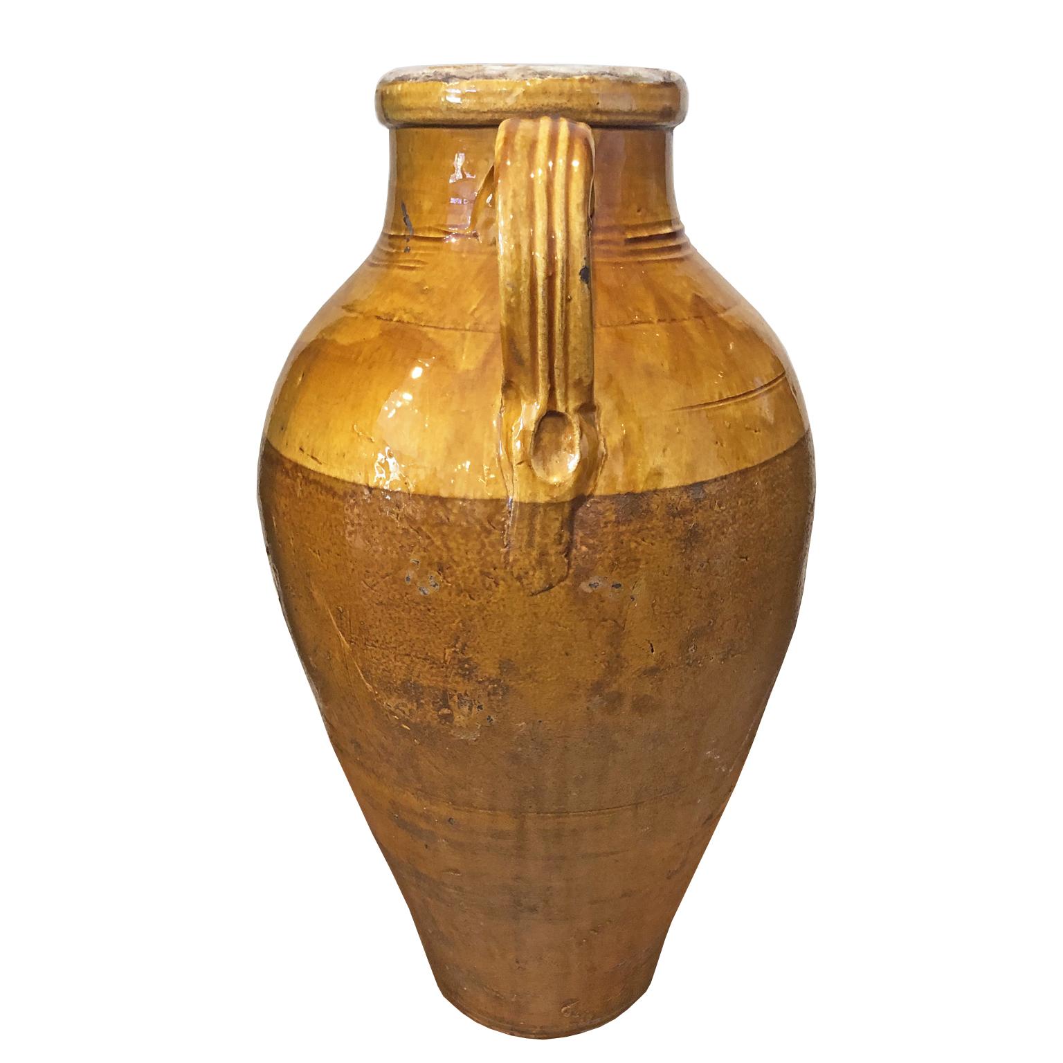 large terracotta urn with handles