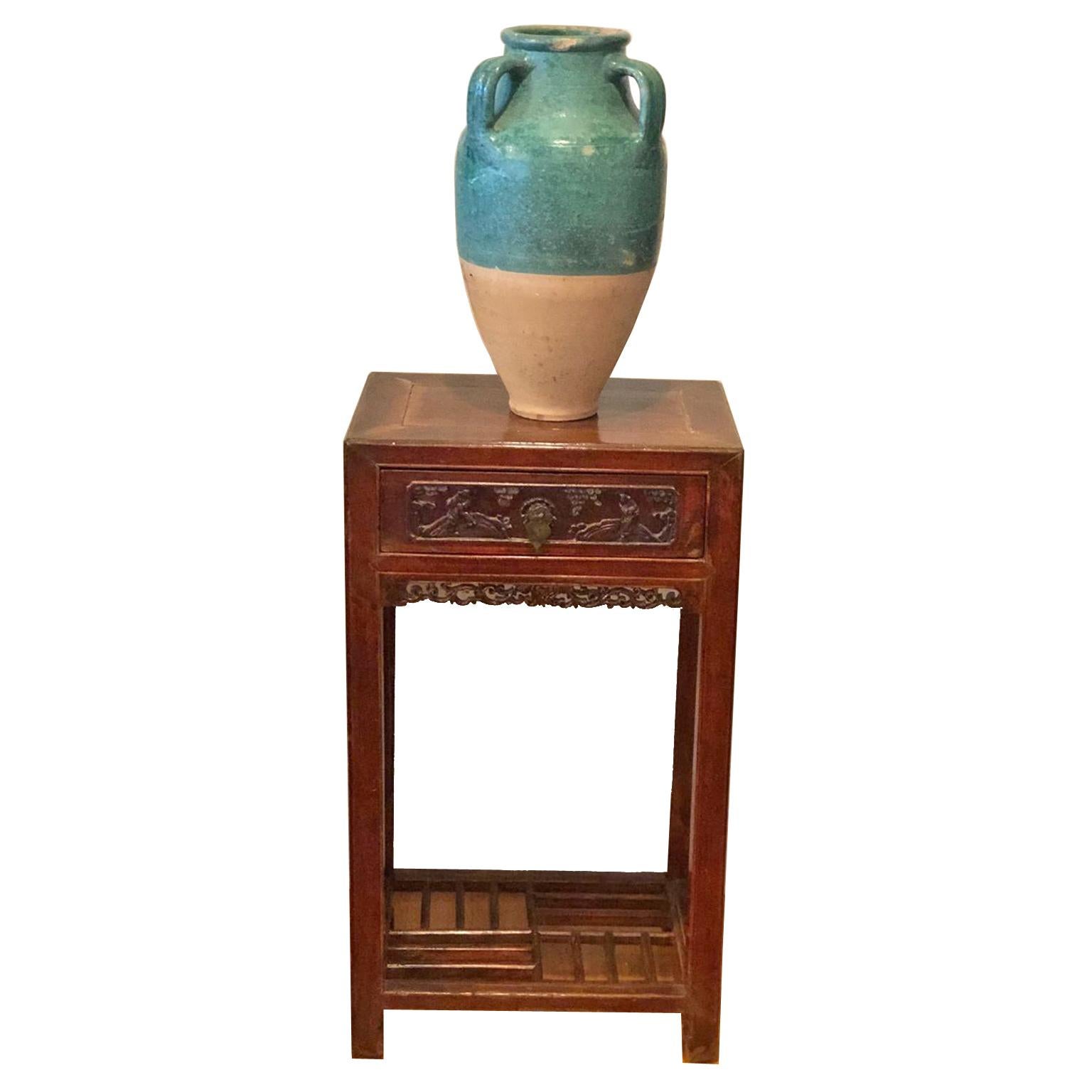 A very beautiful terracotta pot or urn with teal overglaze and three handles. France, circa 1800s. This urn is in very good condition and features a very lovely patina, acquired over its long history.

Measurements: 9
