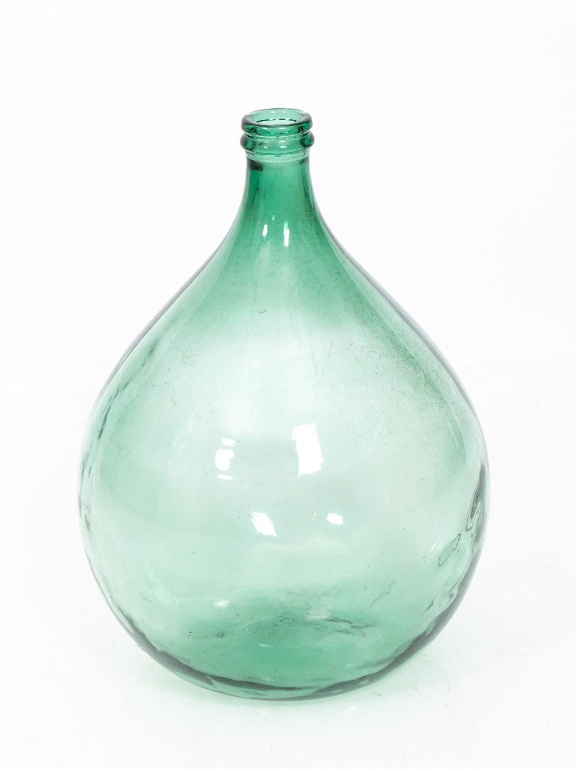 French wine bottle in green glass, circa 1890s. Please note of wear consistent with age.