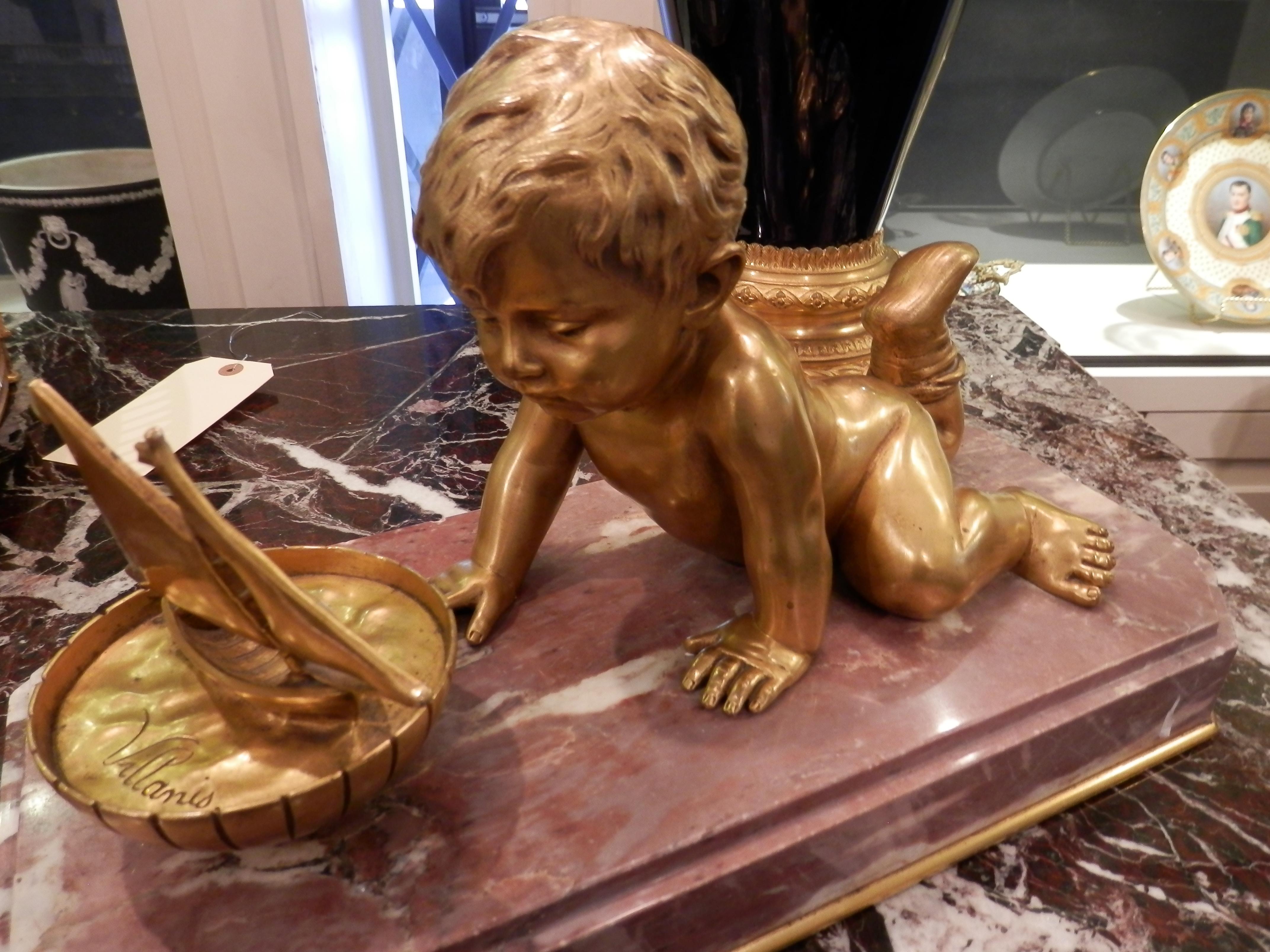 French 19th Century Large Gilt Bronze Cherub Playing with His Toy Boat on a Marble Base For Sale